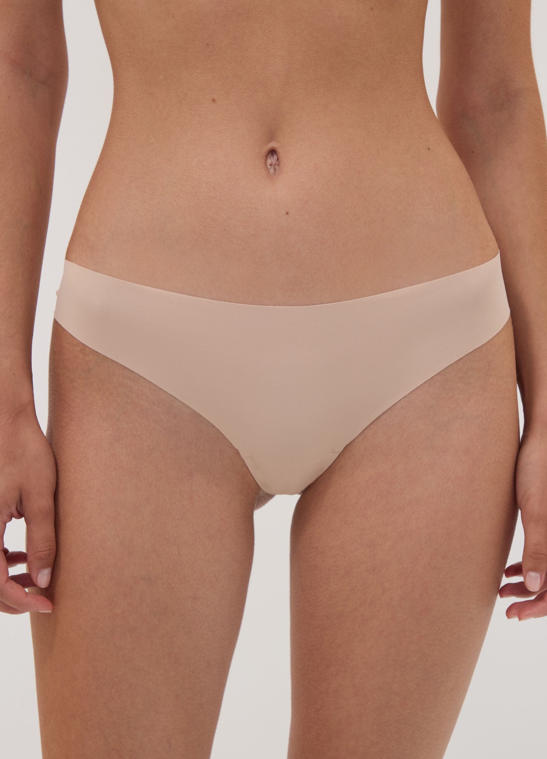 Beige Brazilian briefs in stretch microfibre with lace