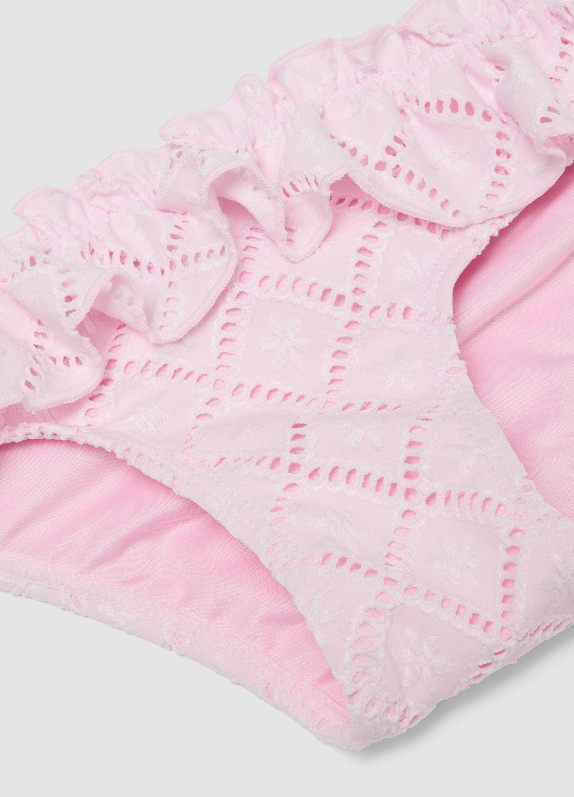 Pink stretchy bikini bottoms with frill