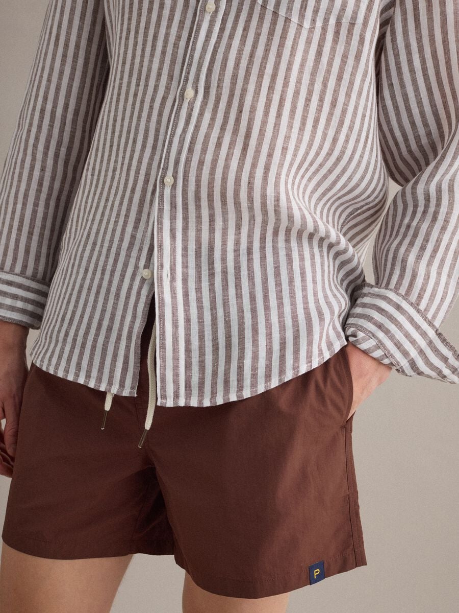 Brown swim shorts with elasticated waistband and drawstring_3