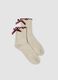 Beige organic cotton-blend socks with bow_0
