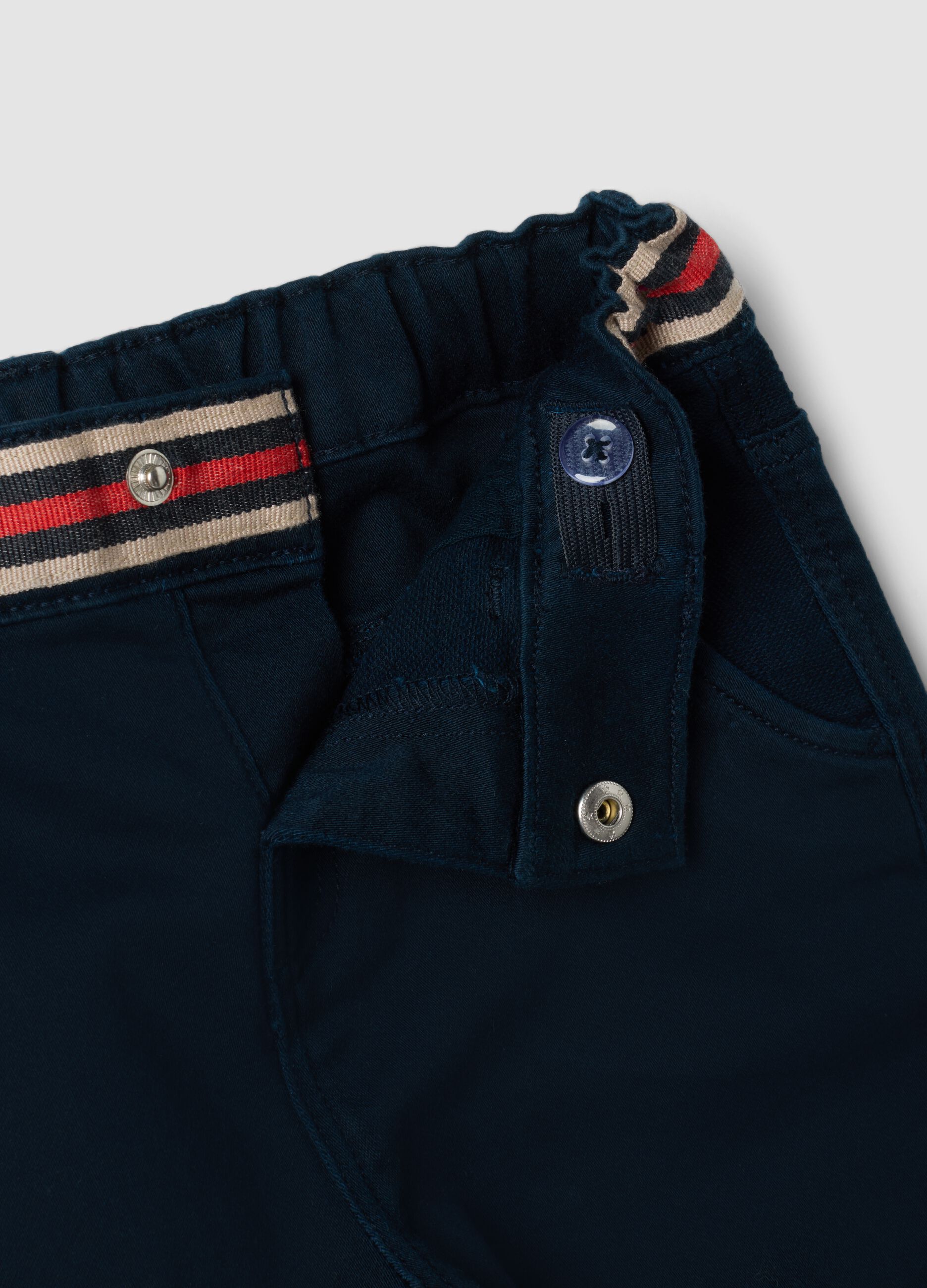 Blue stretch cotton trousers with elasticated waist for baby boy