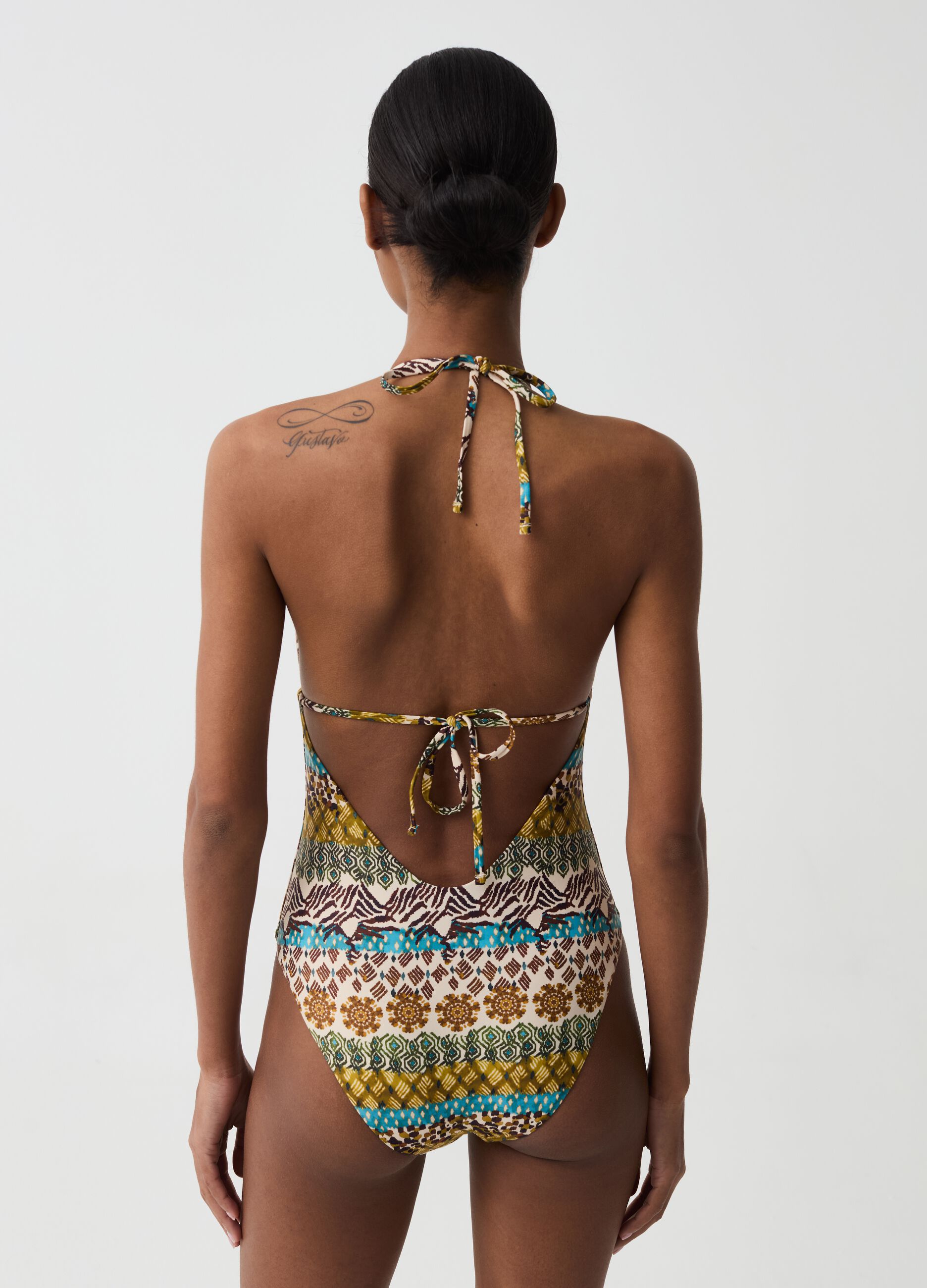 One-piece swimsuit with traditional print