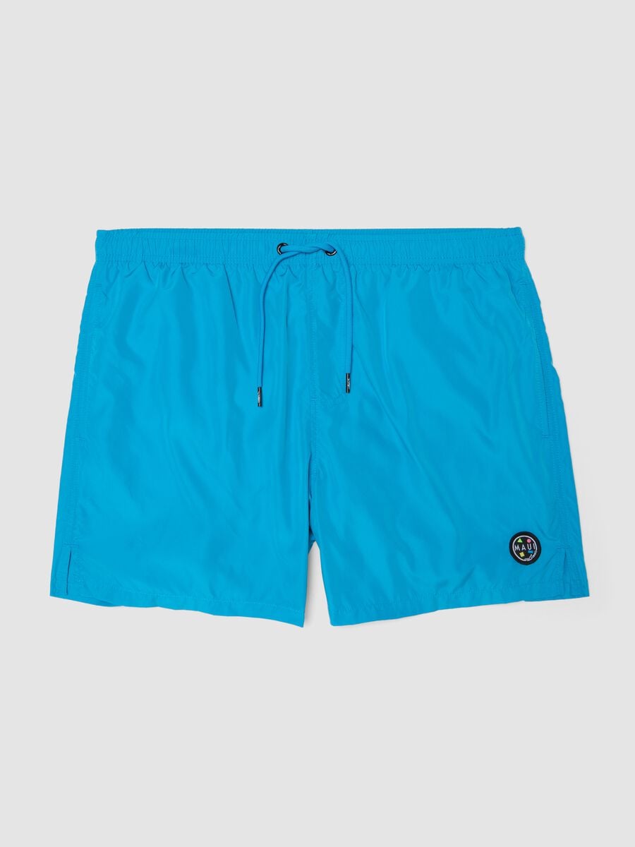 Ba&ntilde;ador tipo bermuda azul con cintura el&aacute;stica y cord&oacute;n_0