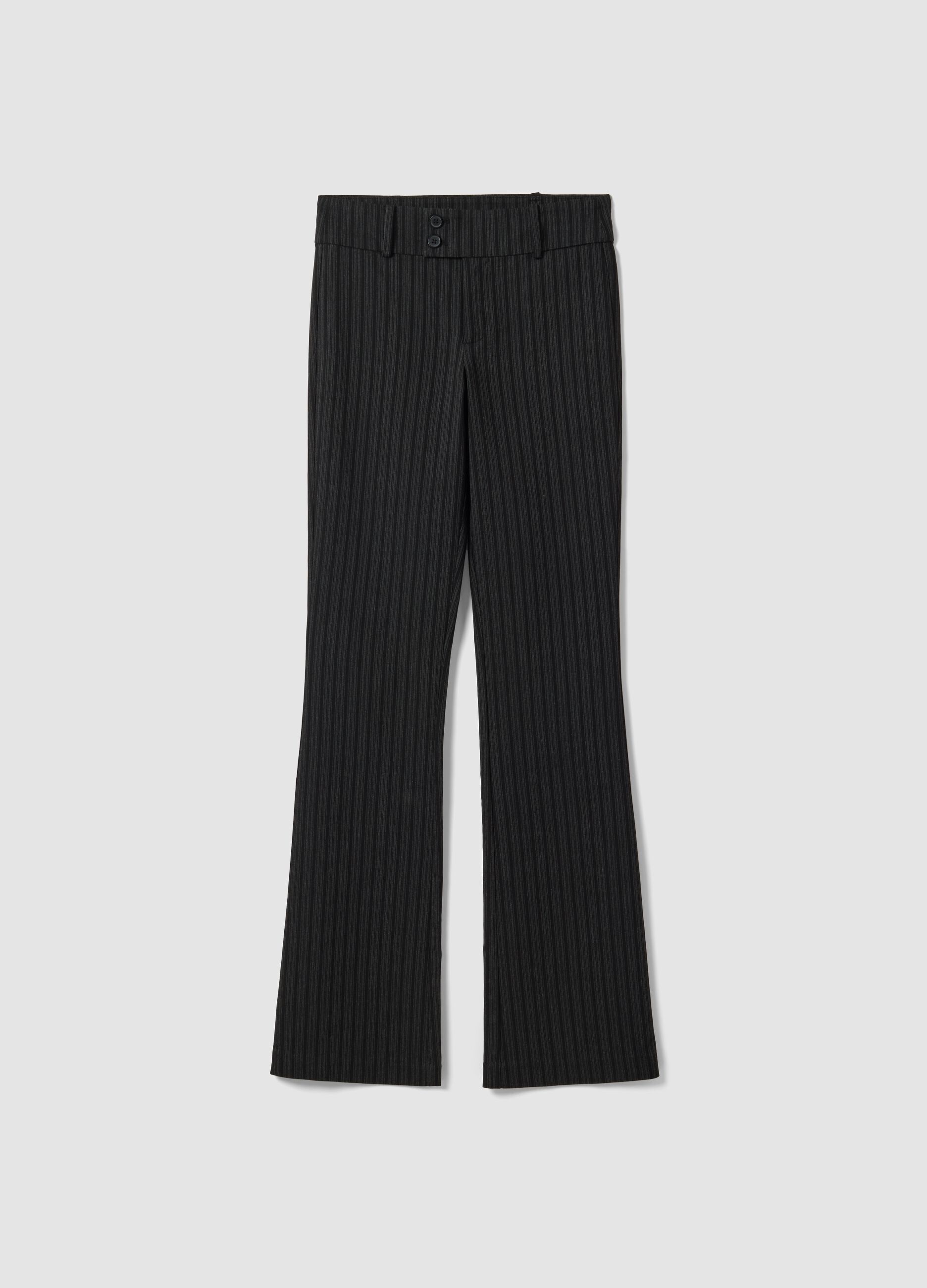 Pantaloni neri flare in viscosa elasticizzata con fantasia gessata