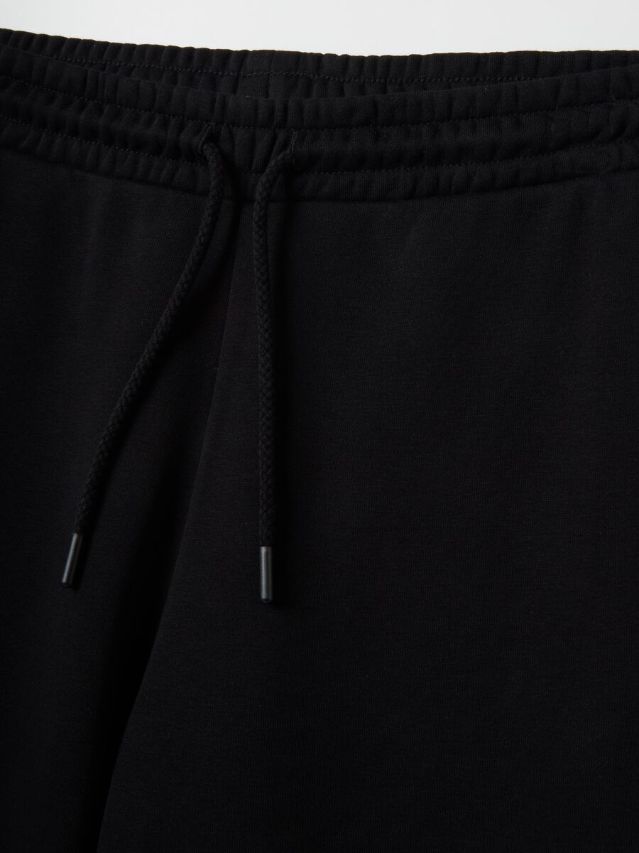 Black cotton blend regular fit trousers_5
