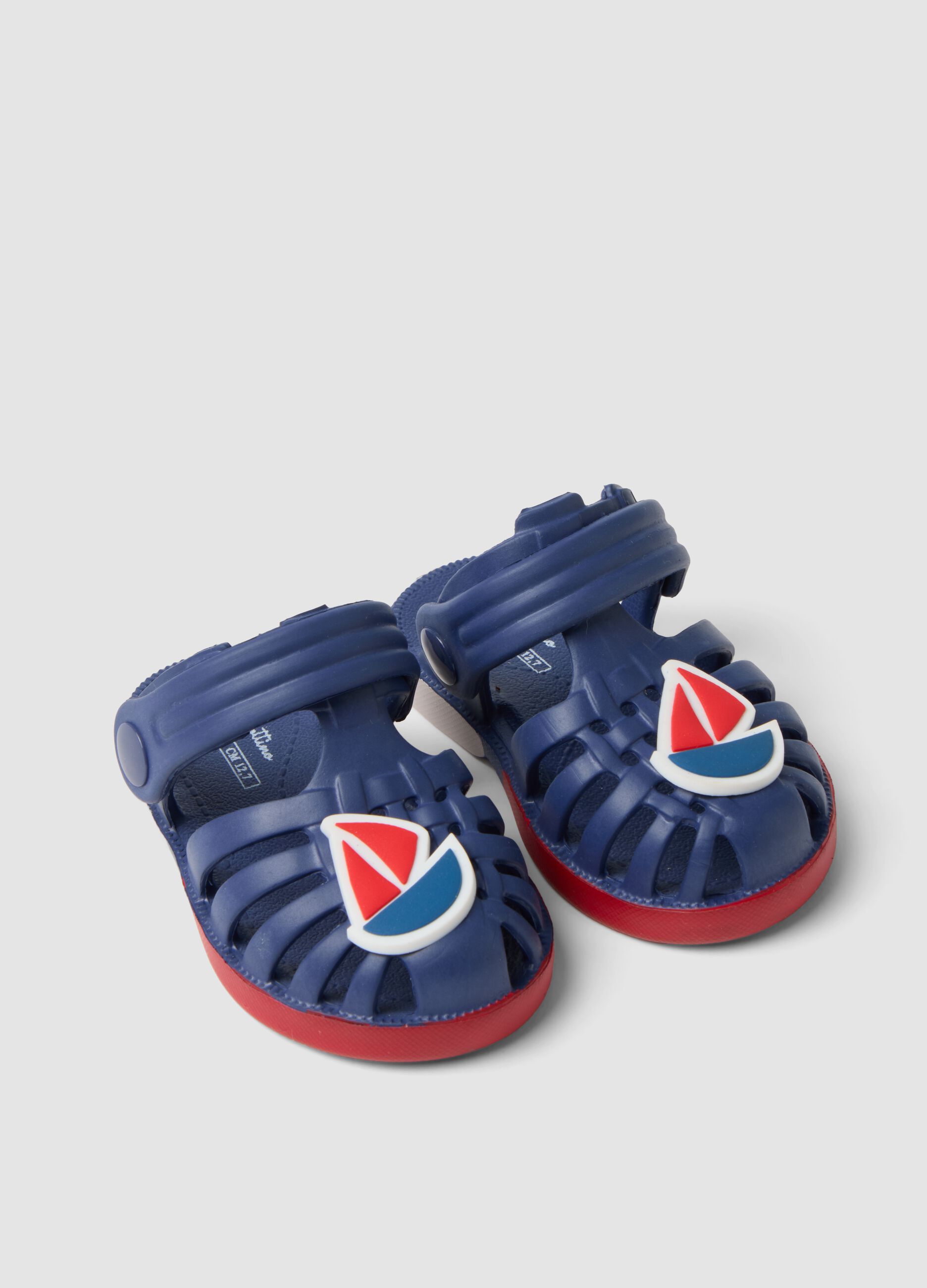 Blue beach sandals with little boat motif