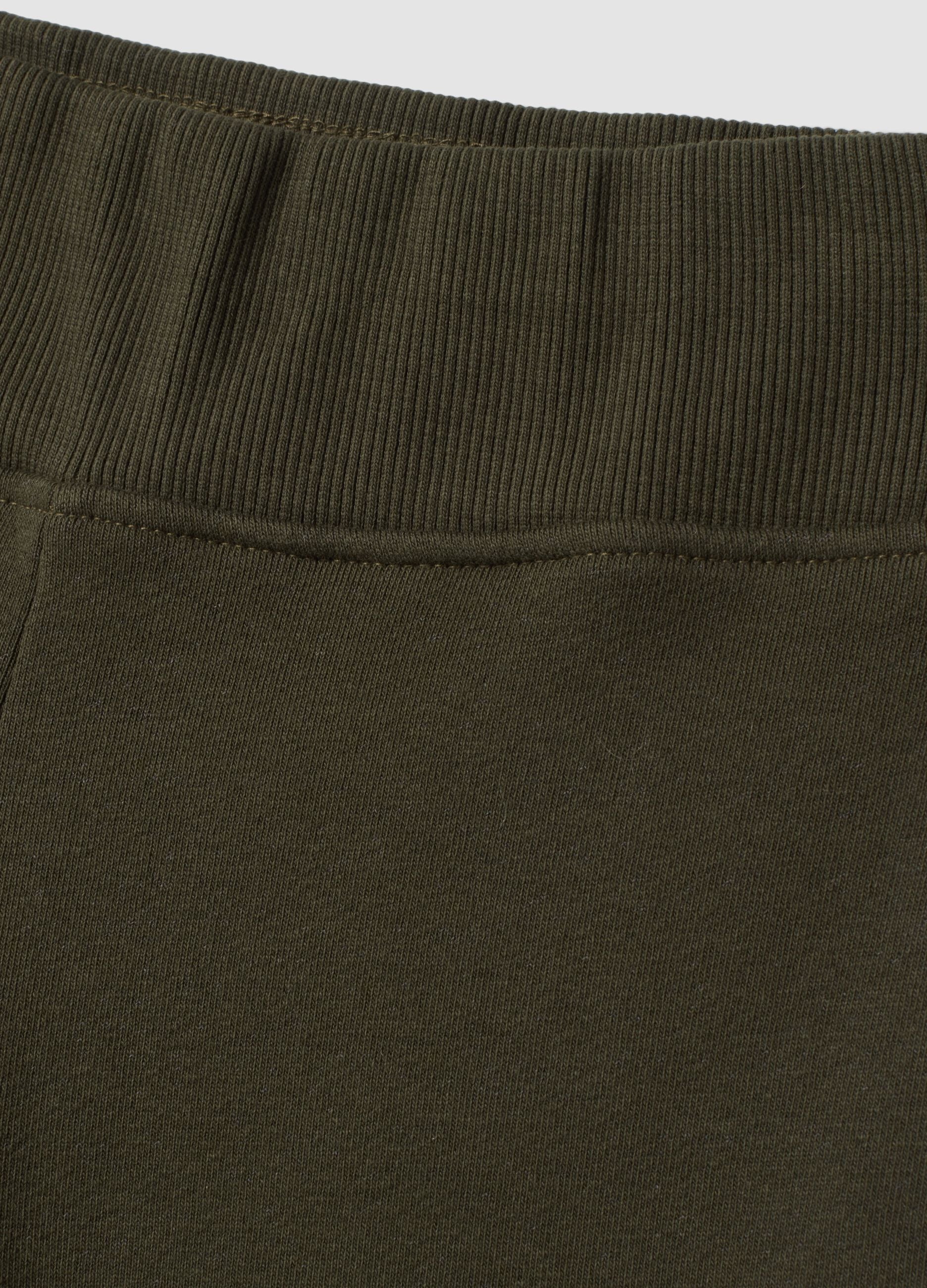 Pantaloni verdi flare in cotone elasticizzato