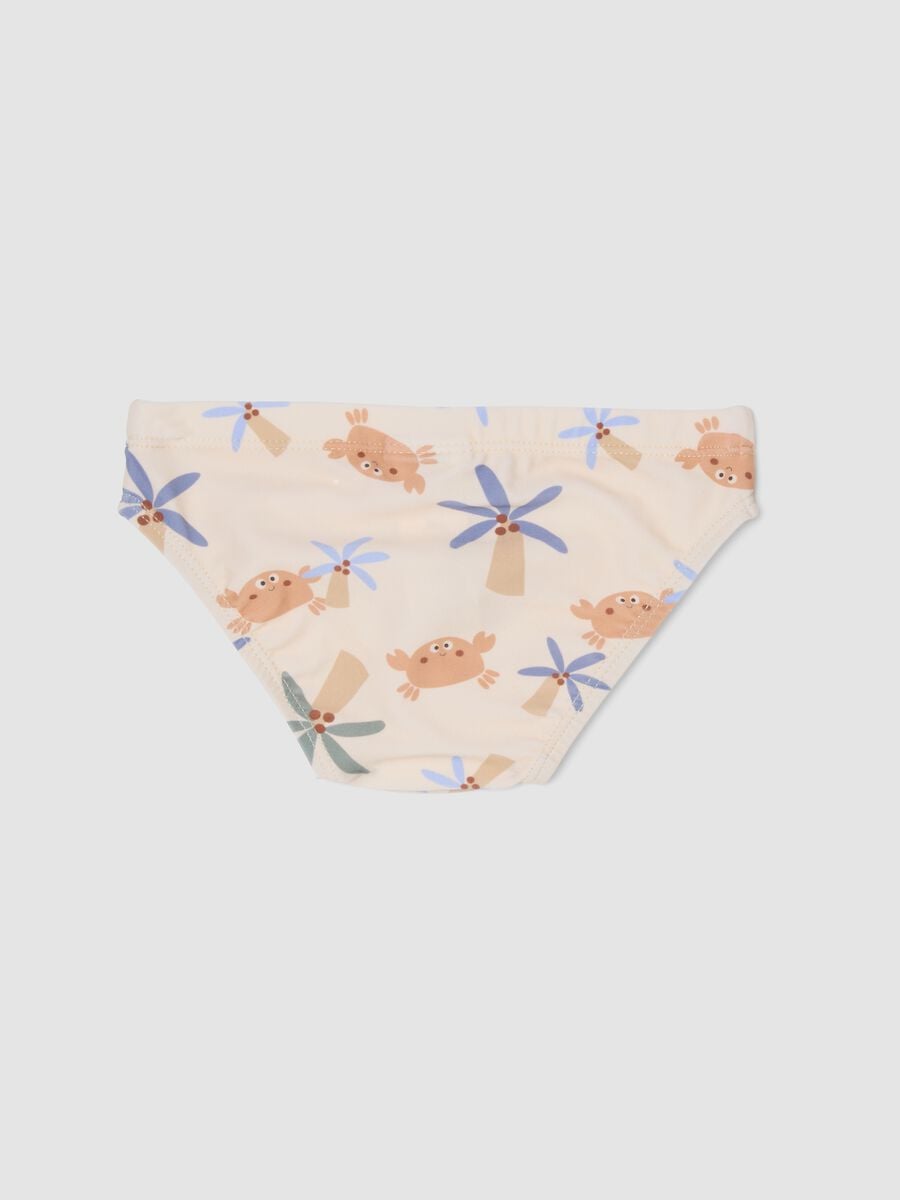 Beige baby swim briefs with prints_1