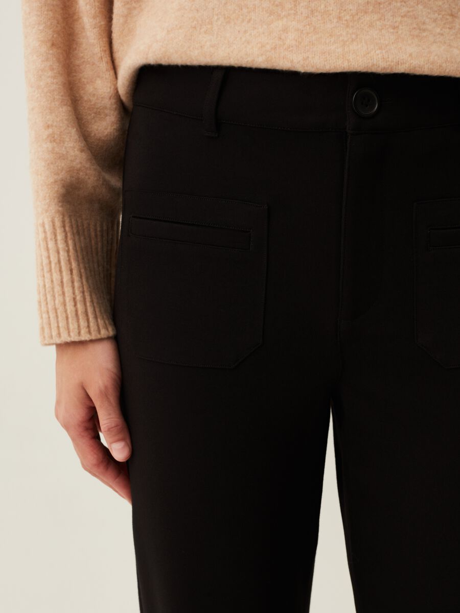 Flare-fit trousers with pockets_3