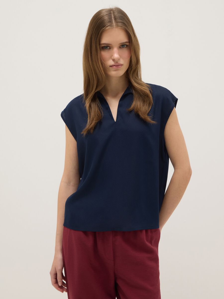 Sleeveless blouse in pure blue viscose, regular fit with V-neck_0