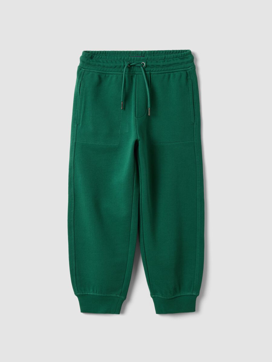 Green pure cotton jogger trousers with elasticated waist for boys_0
