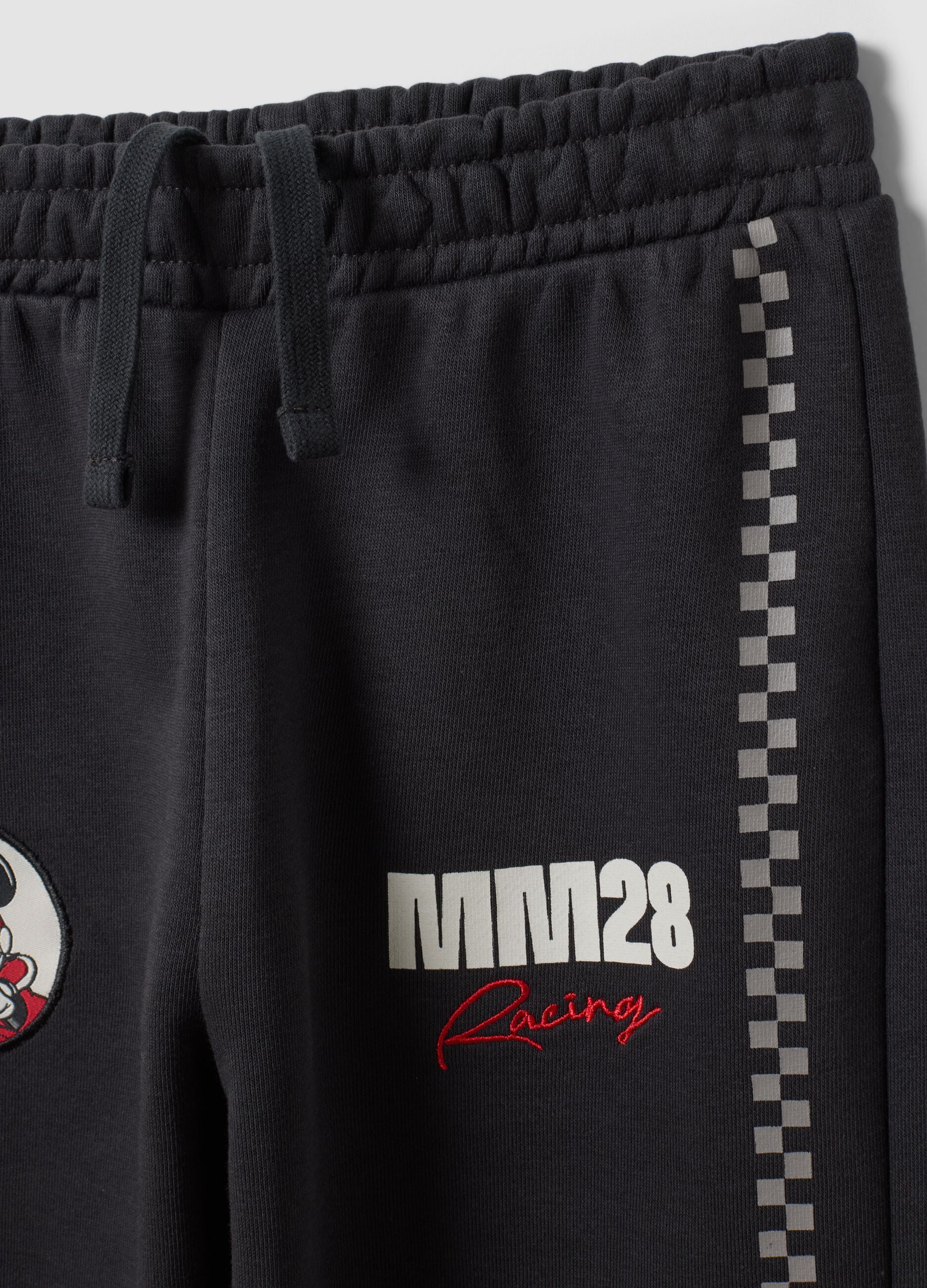 Black cotton-blend joggers with elasticated waist and Mickey print