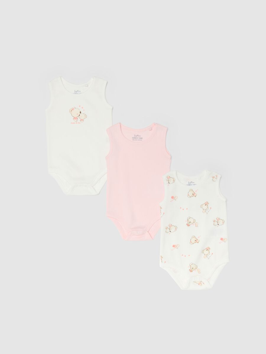Pack of three sleeveless multicolour bodysuits in pure cotton for baby girls_0