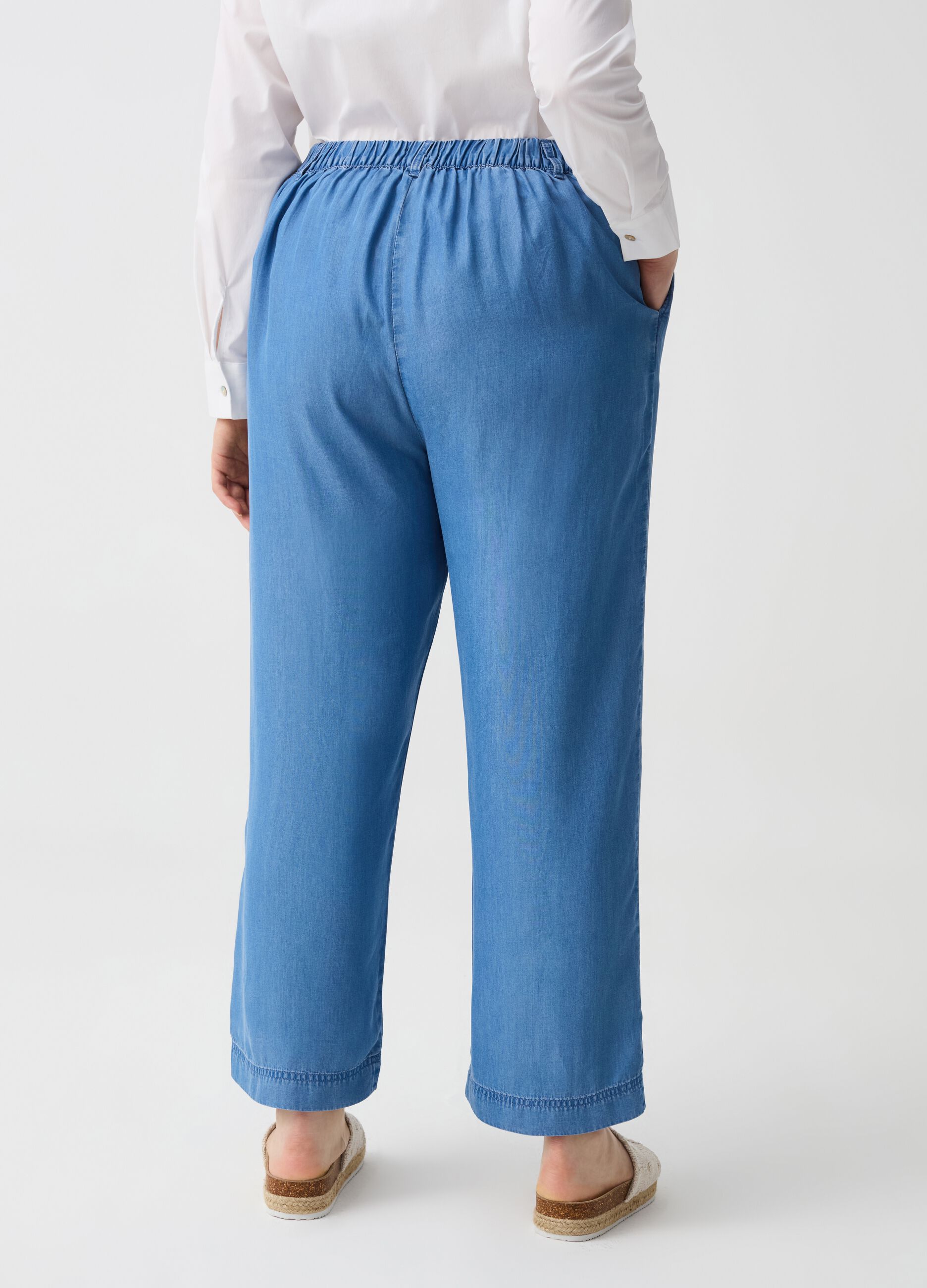 Curvy flowing wide-leg denim-effect trousers