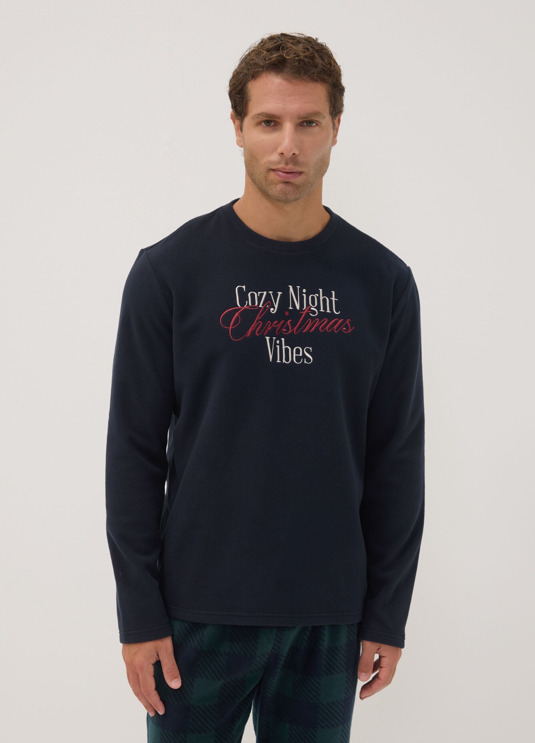 Navy blue long pyjamas with crew neck top and check trousers