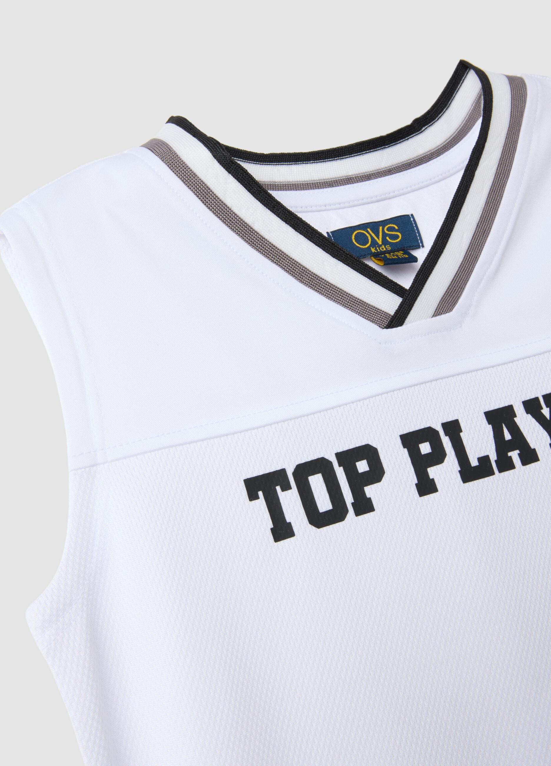 Conjunto branco e azul com camisola de al&ccedil;as e cal&ccedil;&otilde;es