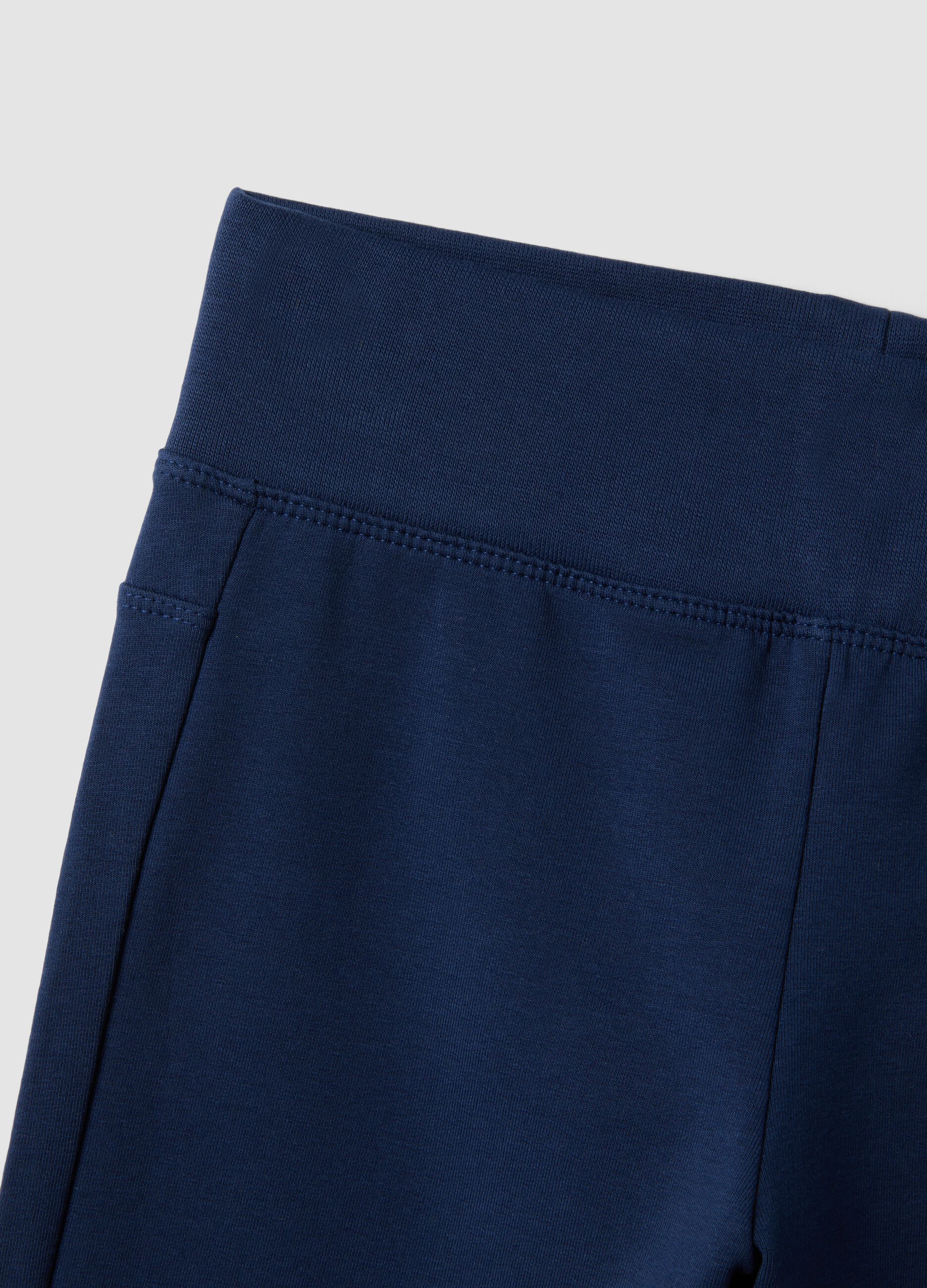 Girls&rsquo; blue flared trousers in stretch organic cotton