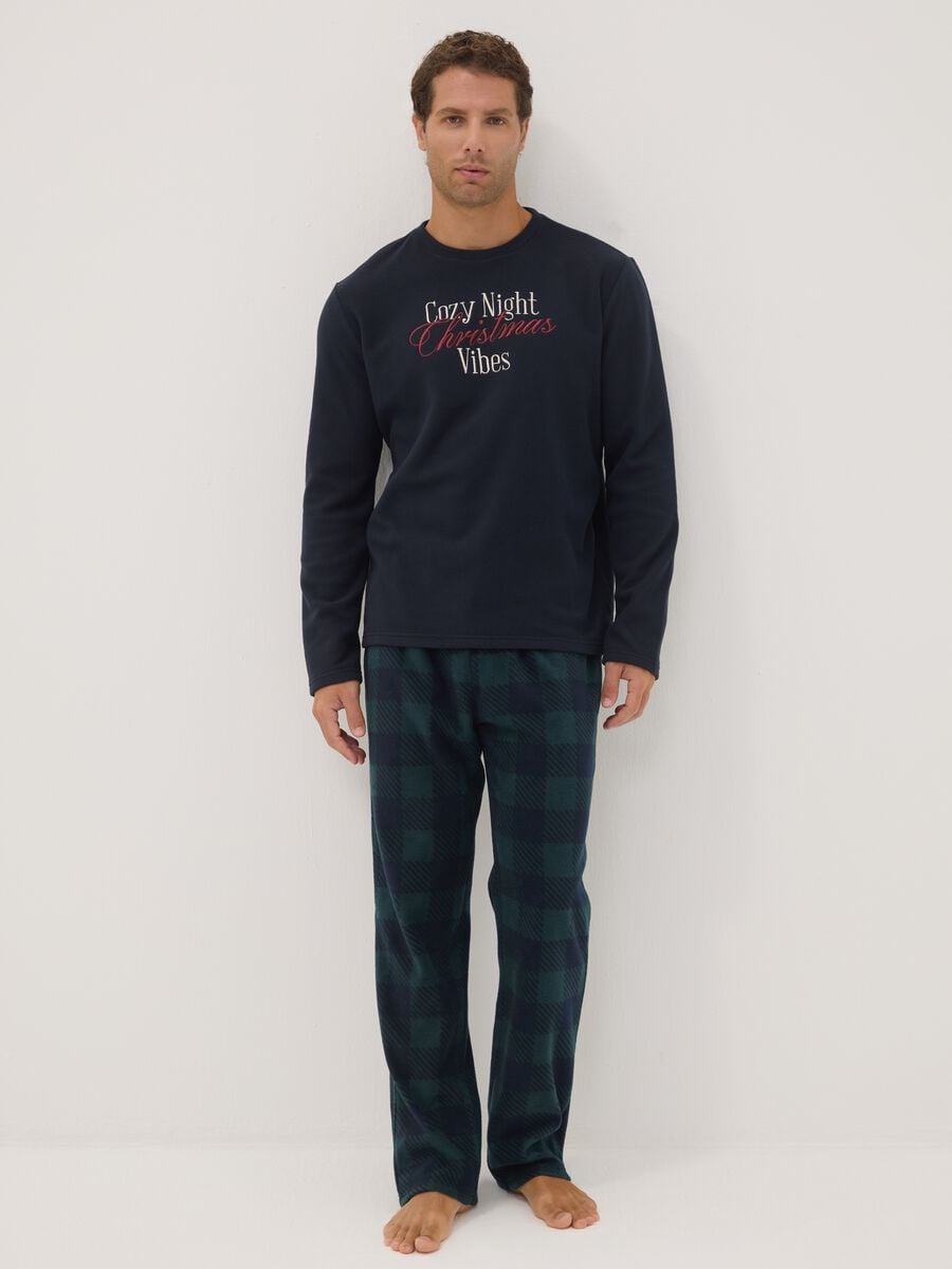 Navy blue long pyjamas with crew neck top and check trousers_0