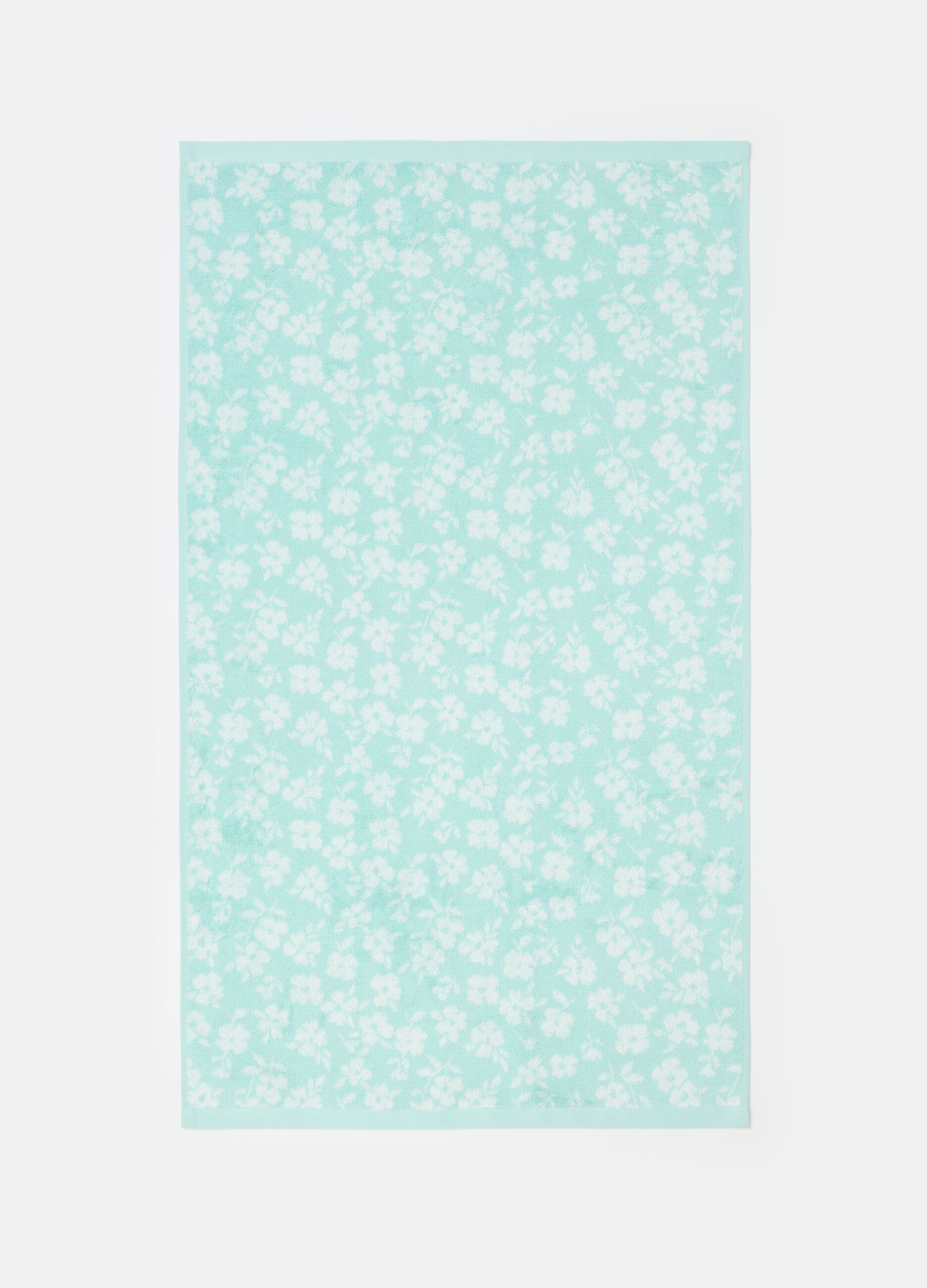Face towel with flowers pattern