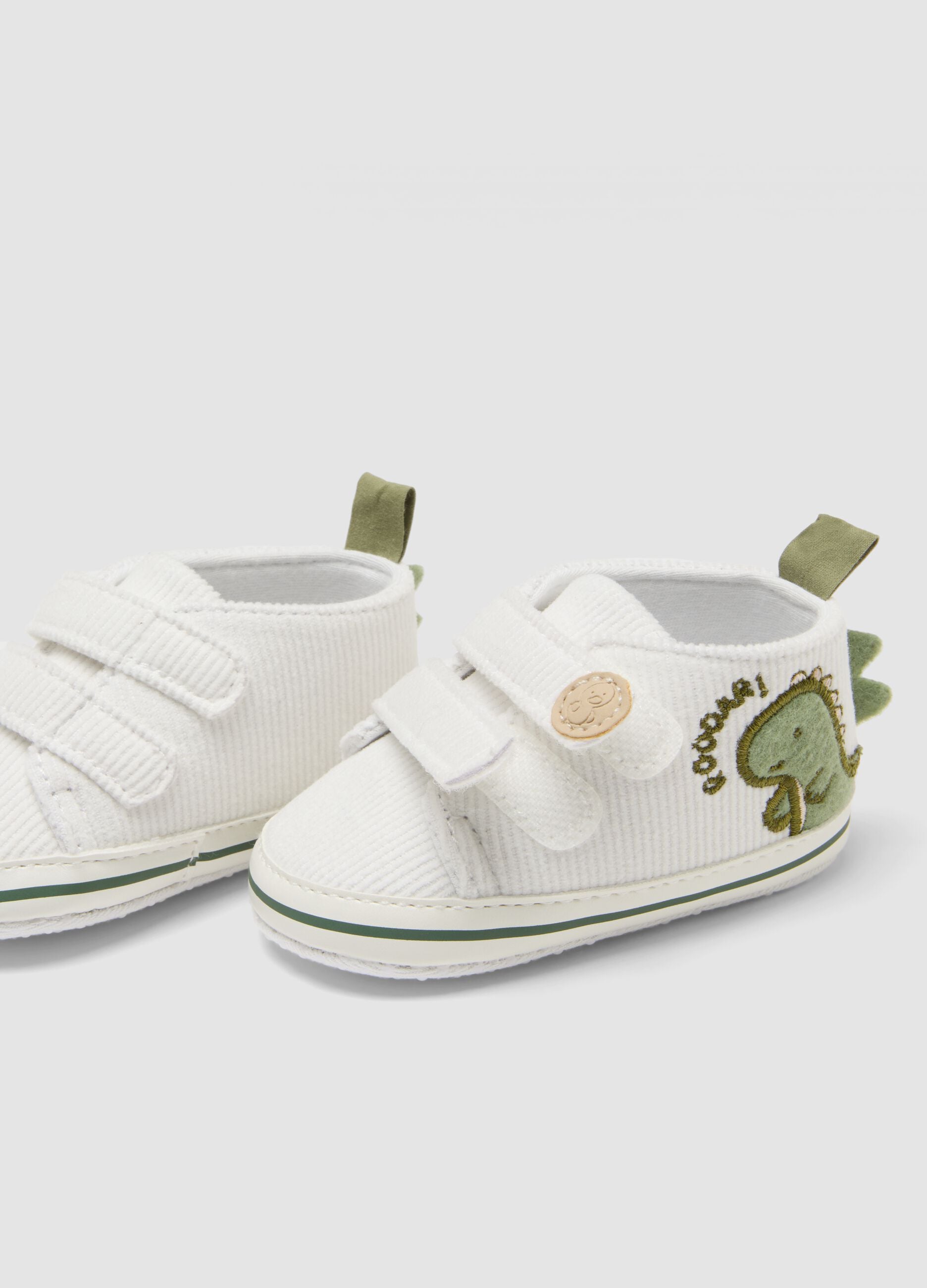 Scarpine bianche con dinosauro e chiusura a strappo