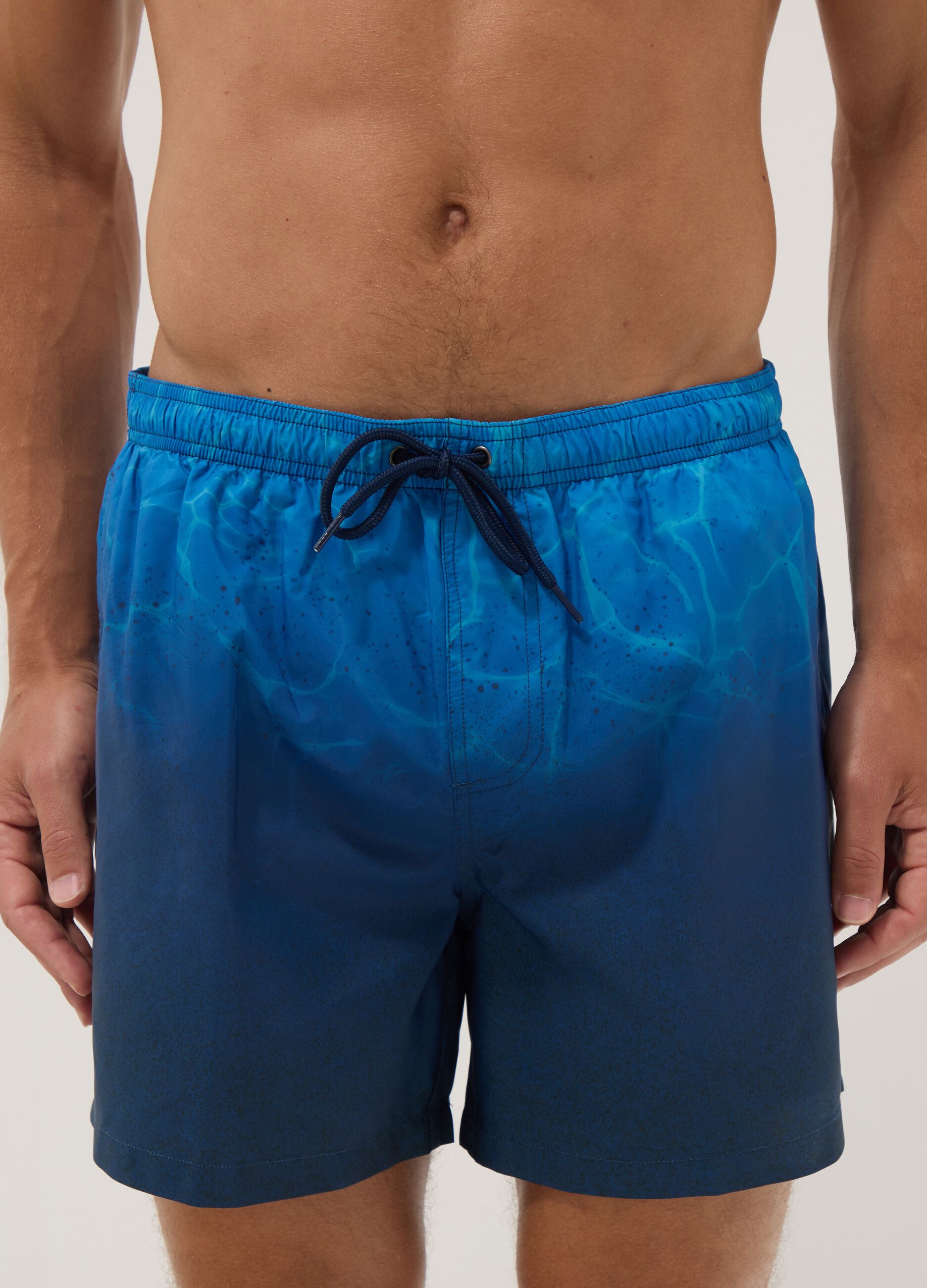 Blue ombr&eacute; swim shorts with elasticated waist