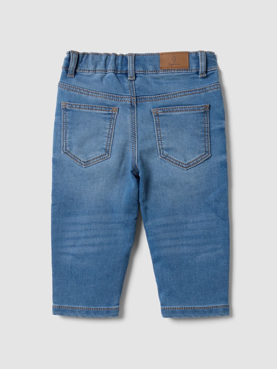 Jeans denim blu chiaro in cotone elasticizzato regular fit per bimbo_1