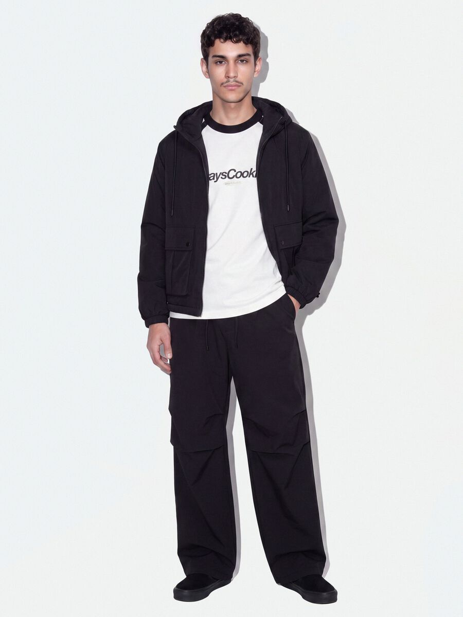 Black stretch-fabric parachute-fit trousers_0