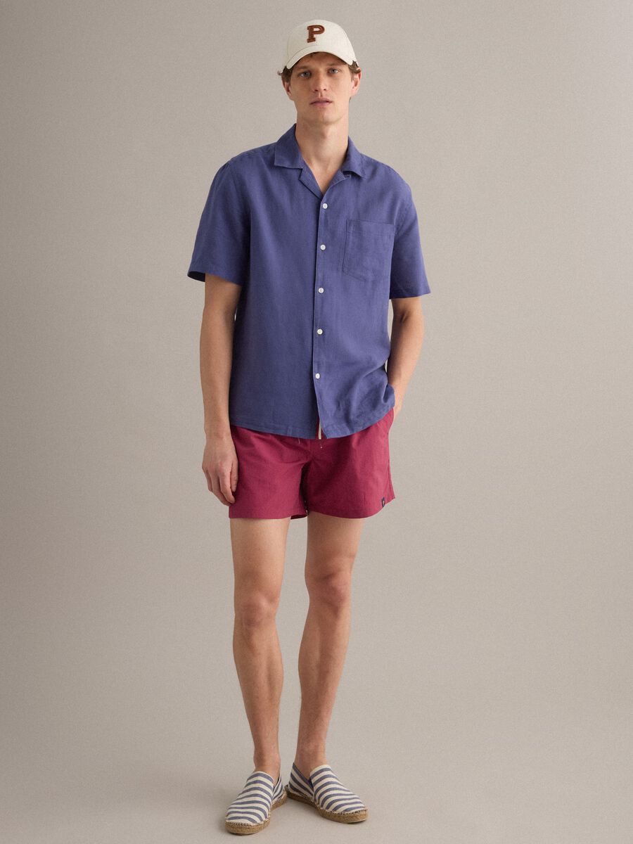Red swim shorts with elasticated waistband and drawstring_3