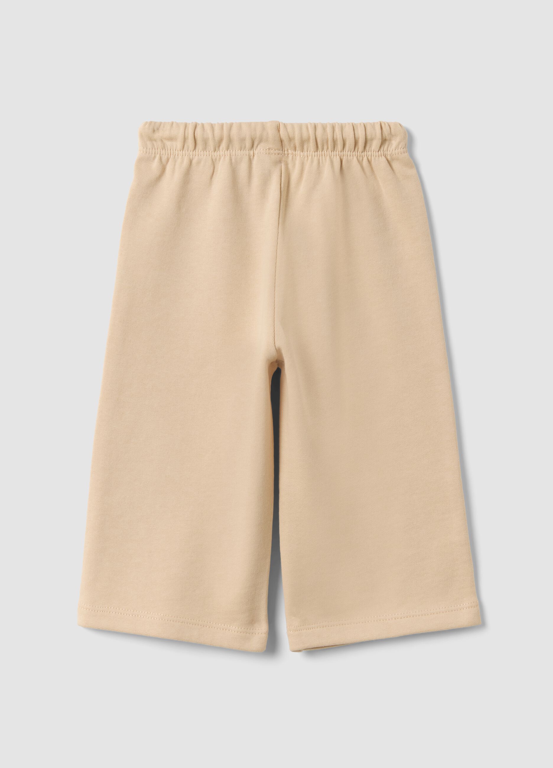 Beige pure cotton trousers with elasticated waist and print for baby girl