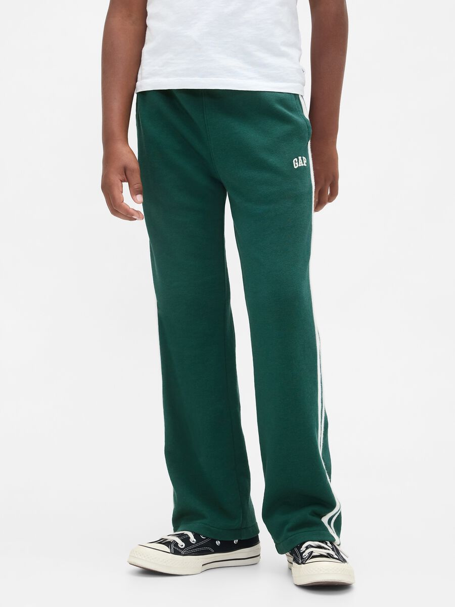 Green knitted trousers for children_1