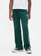 Green knitted trousers for children_1