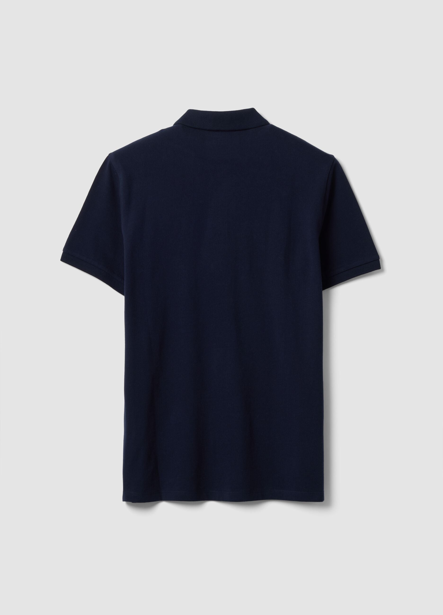 Blue pure cotton piqu&eacute; polo shirt with classic collar and regular fit