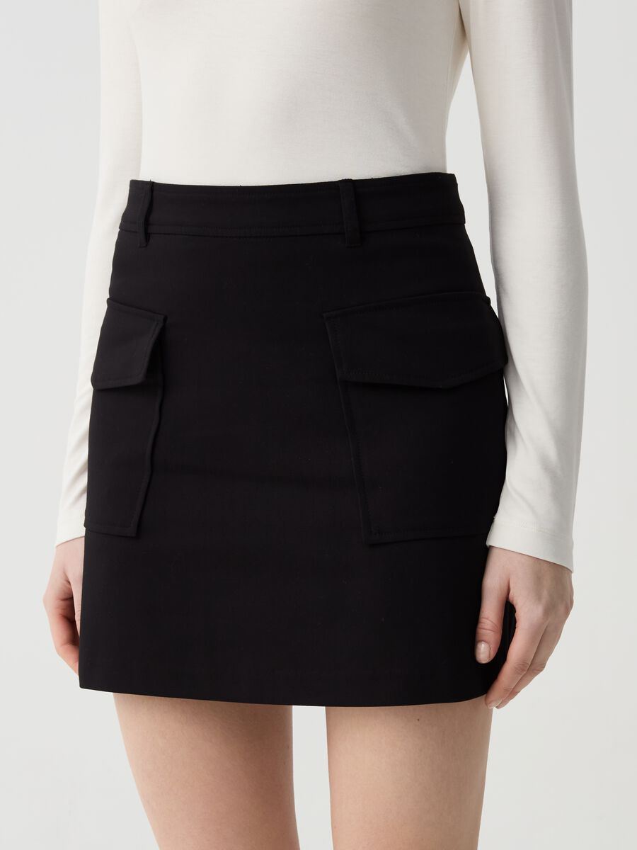 Stretch miniskirt with pockets_1