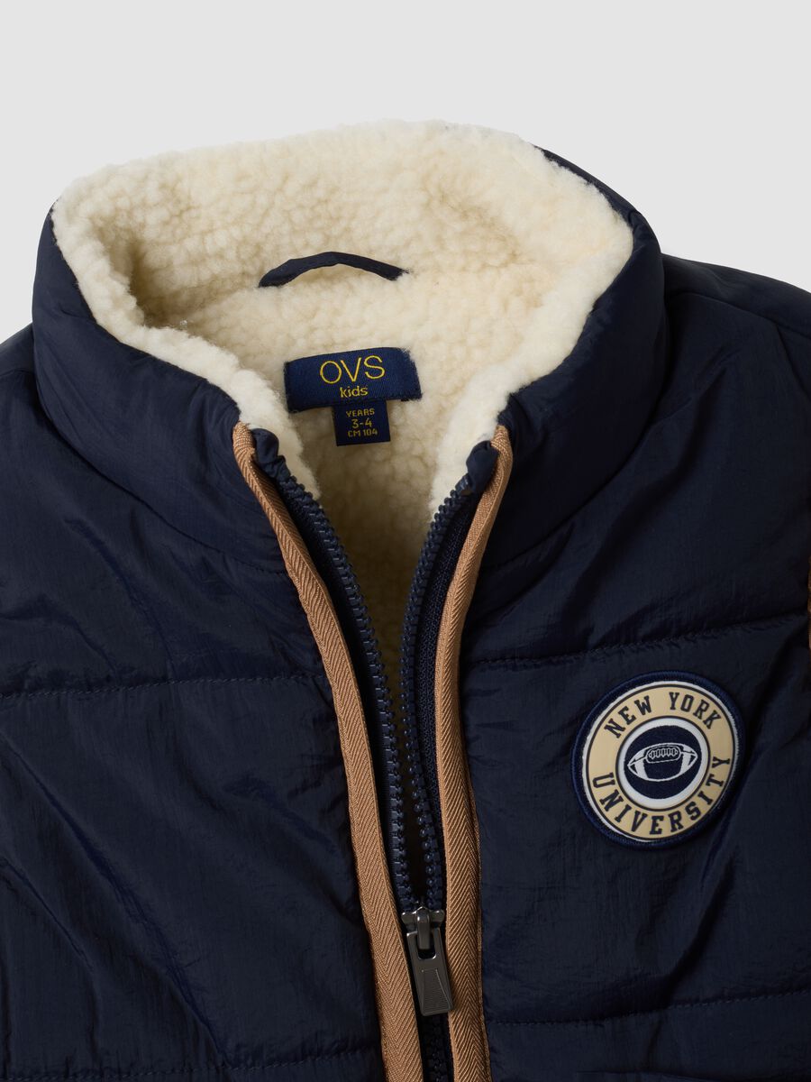 Blue padded gilet with zip and contrast trims_3