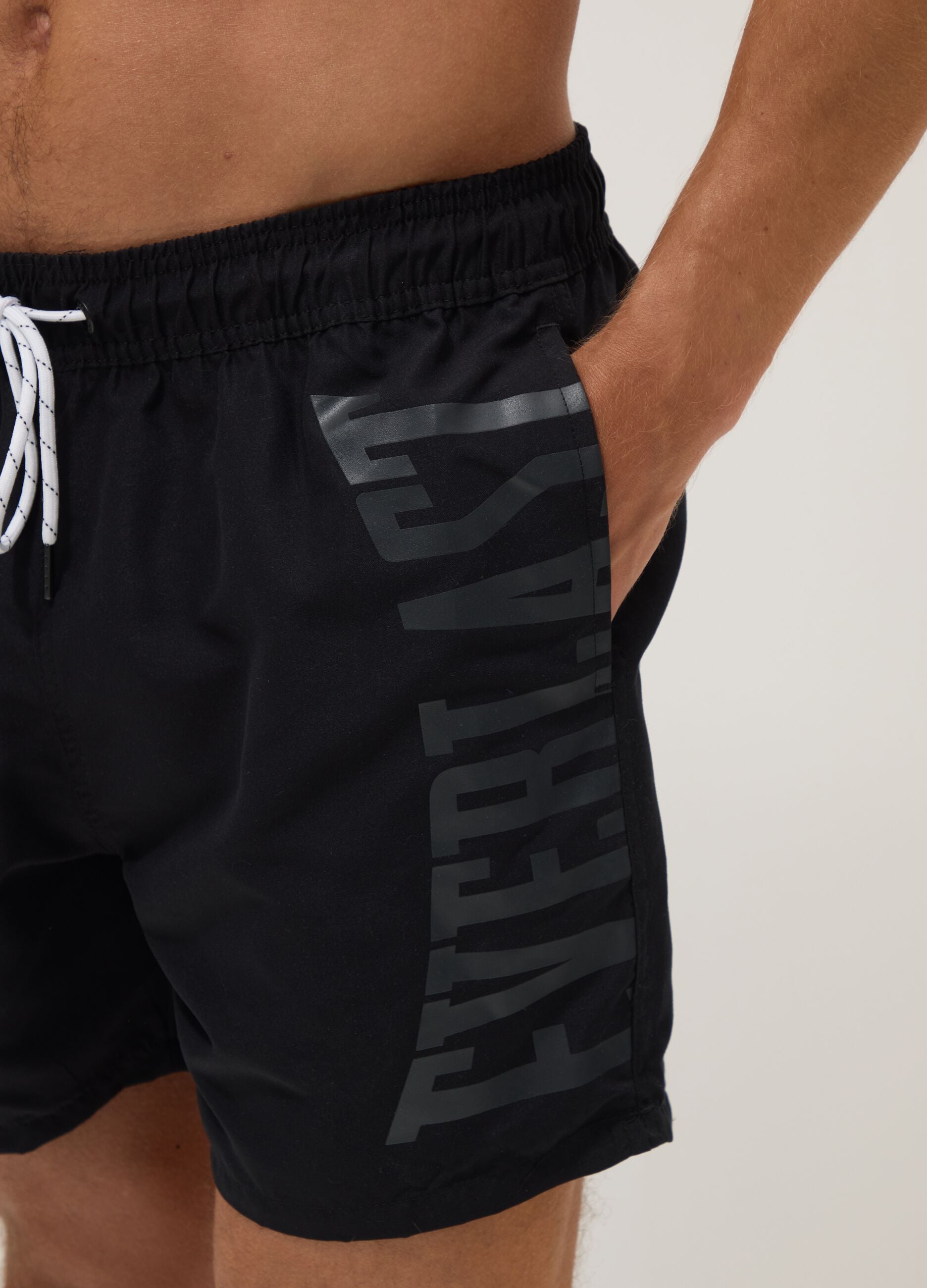 Black swim shorts with drawstring waist