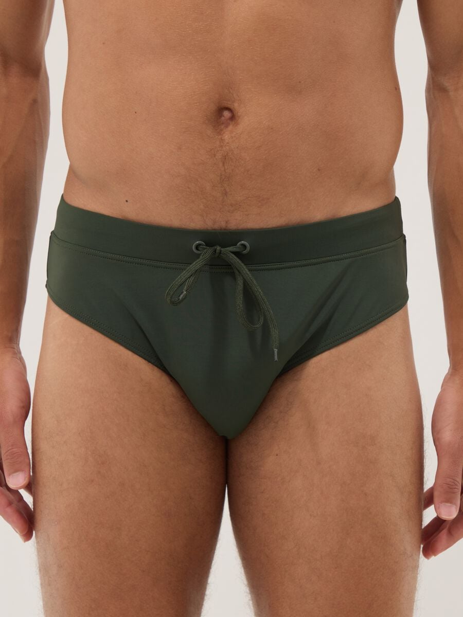 Green stretch fabric swim briefs_1