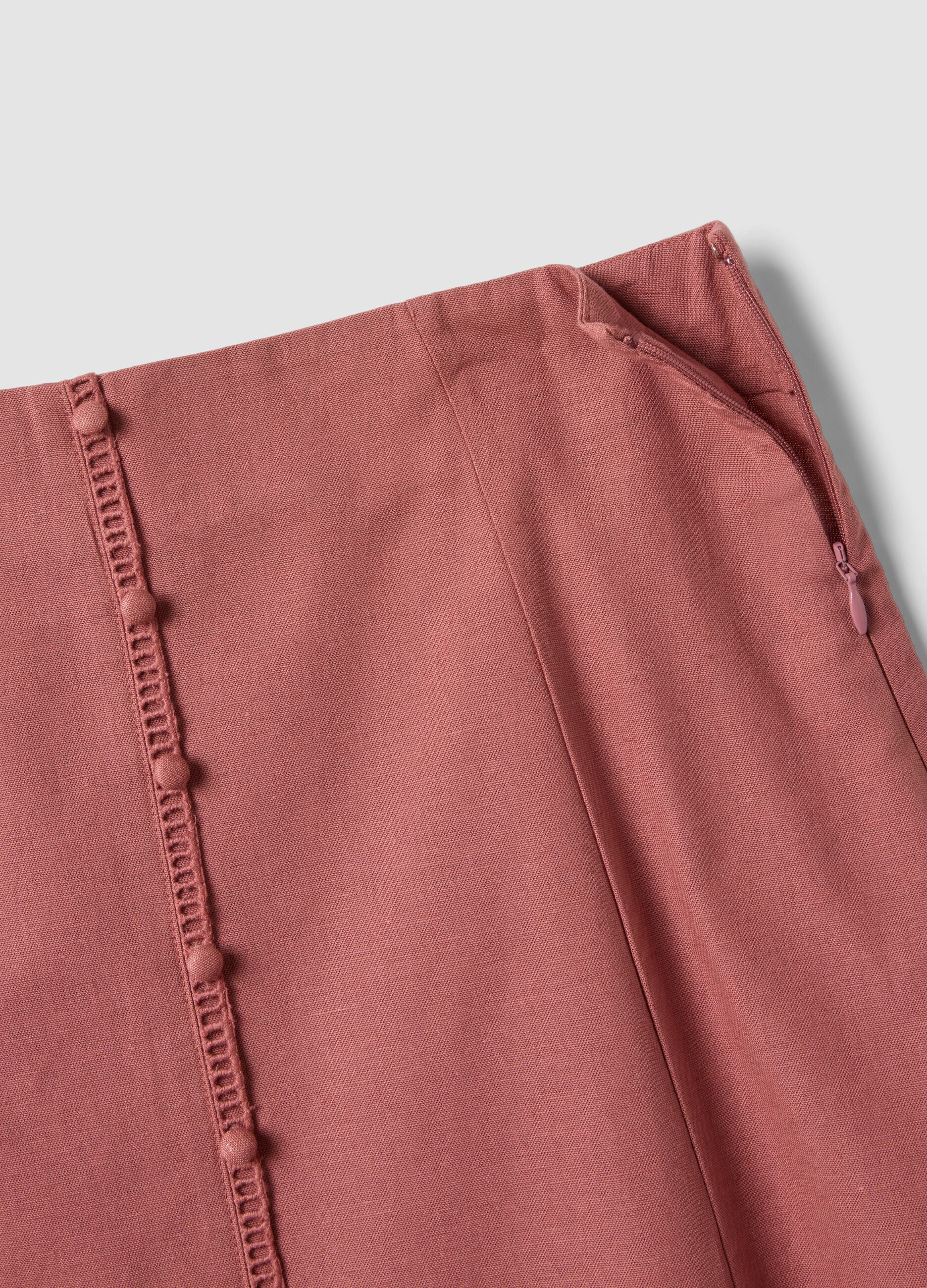 Pink cotton-linen blend skirt with openwork detailing