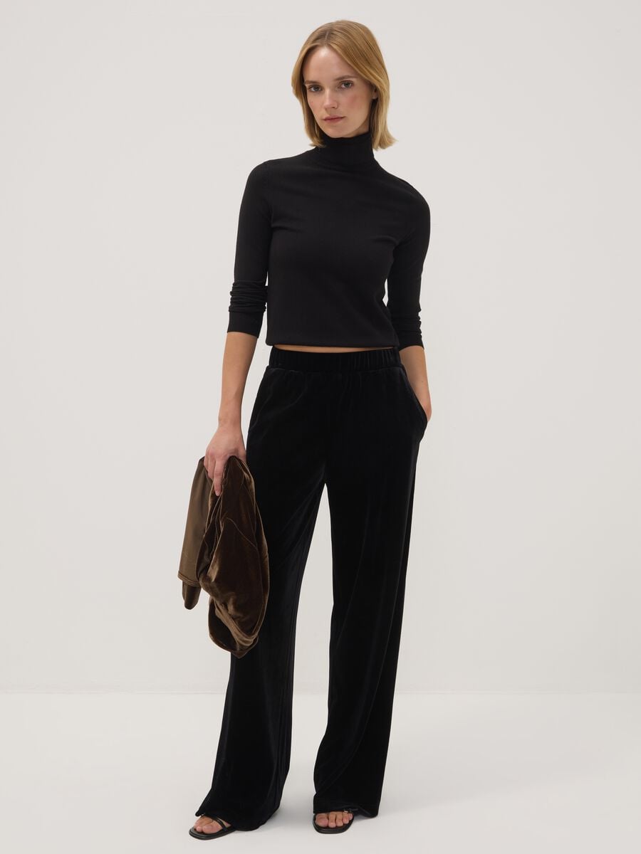 Pantaloni neri wide leg in tessuto velour elasticizzato_0