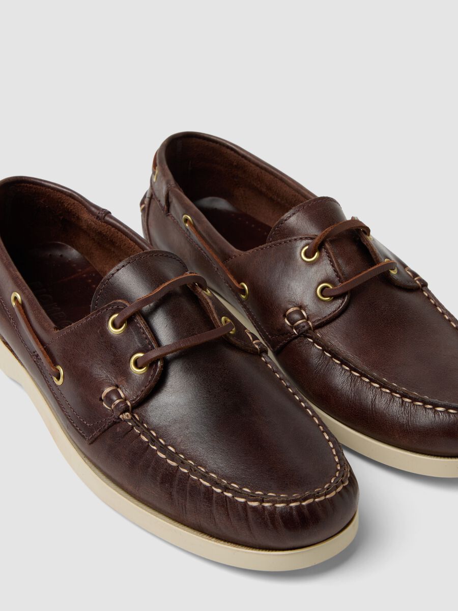 Brown leather boat shoes_1