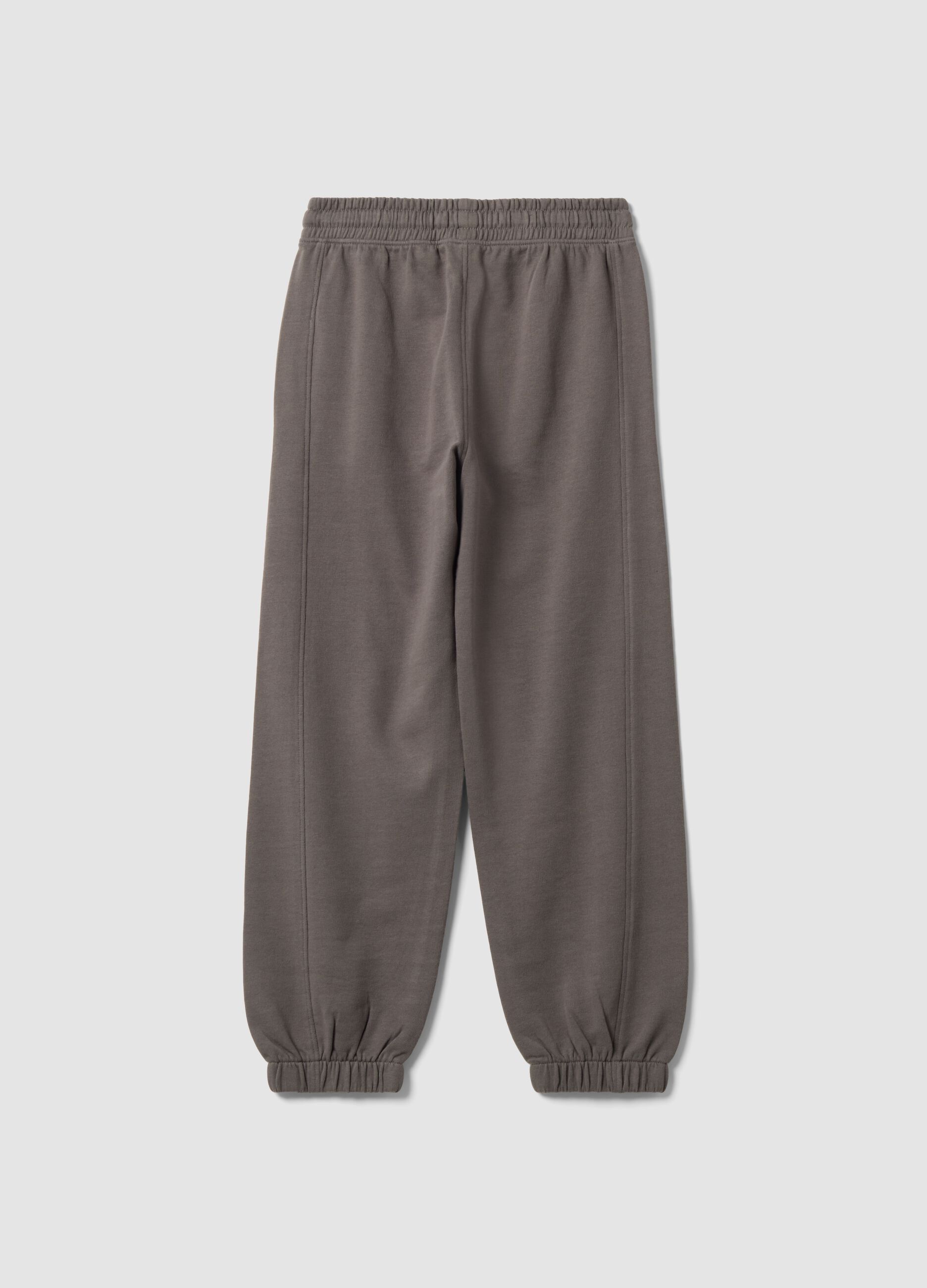 Cal&ccedil;as jogger cinzentas em algod&atilde;o puro, corte oversized, para rapaz