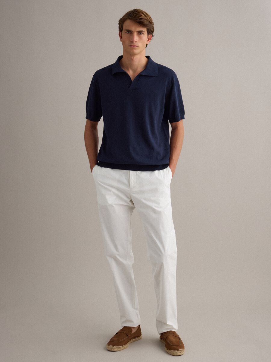 Short-sleeved blue polo in pure cotton_1