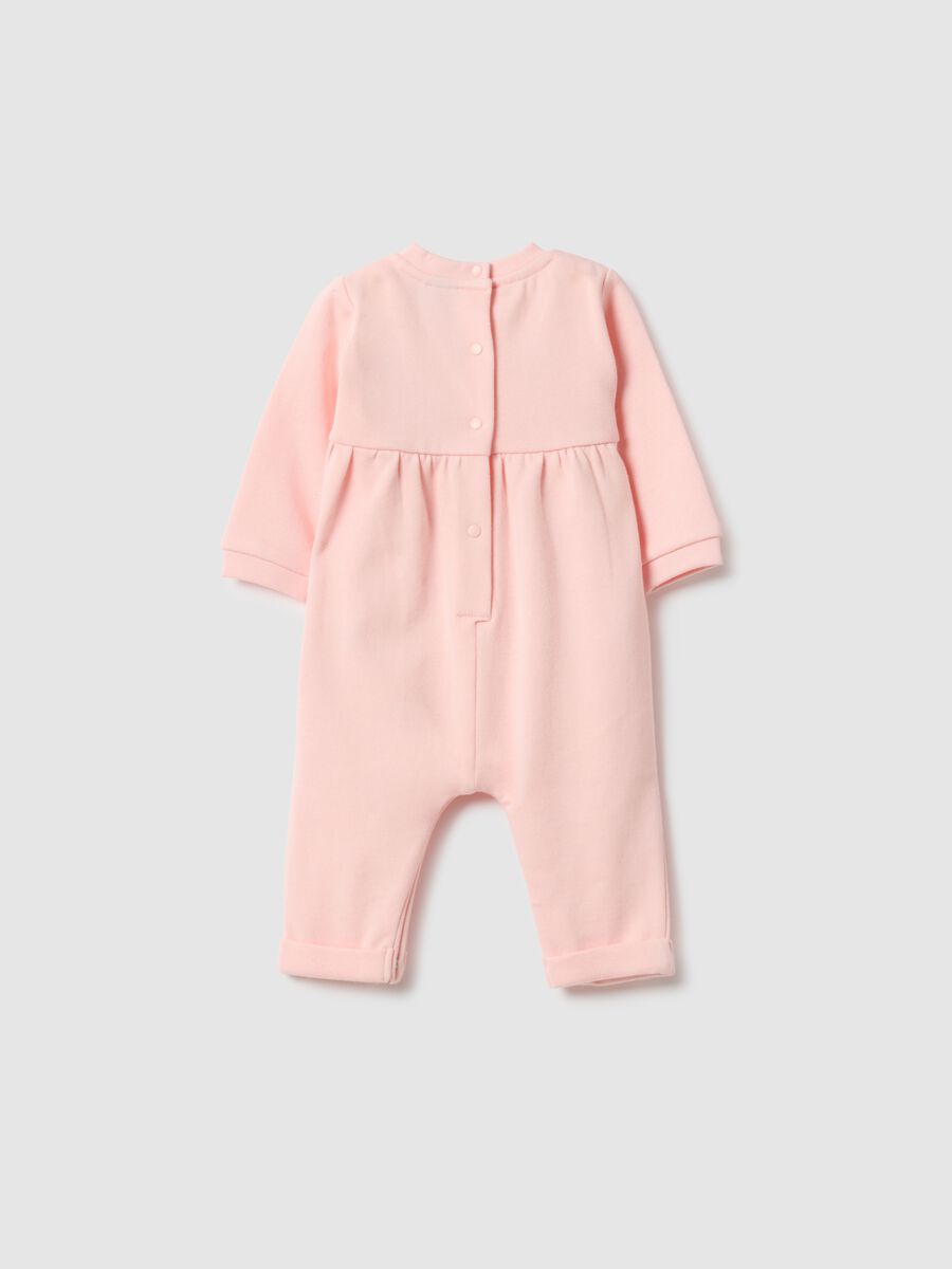 Baby girl's pink cotton sleepsuit with embroidered details_1