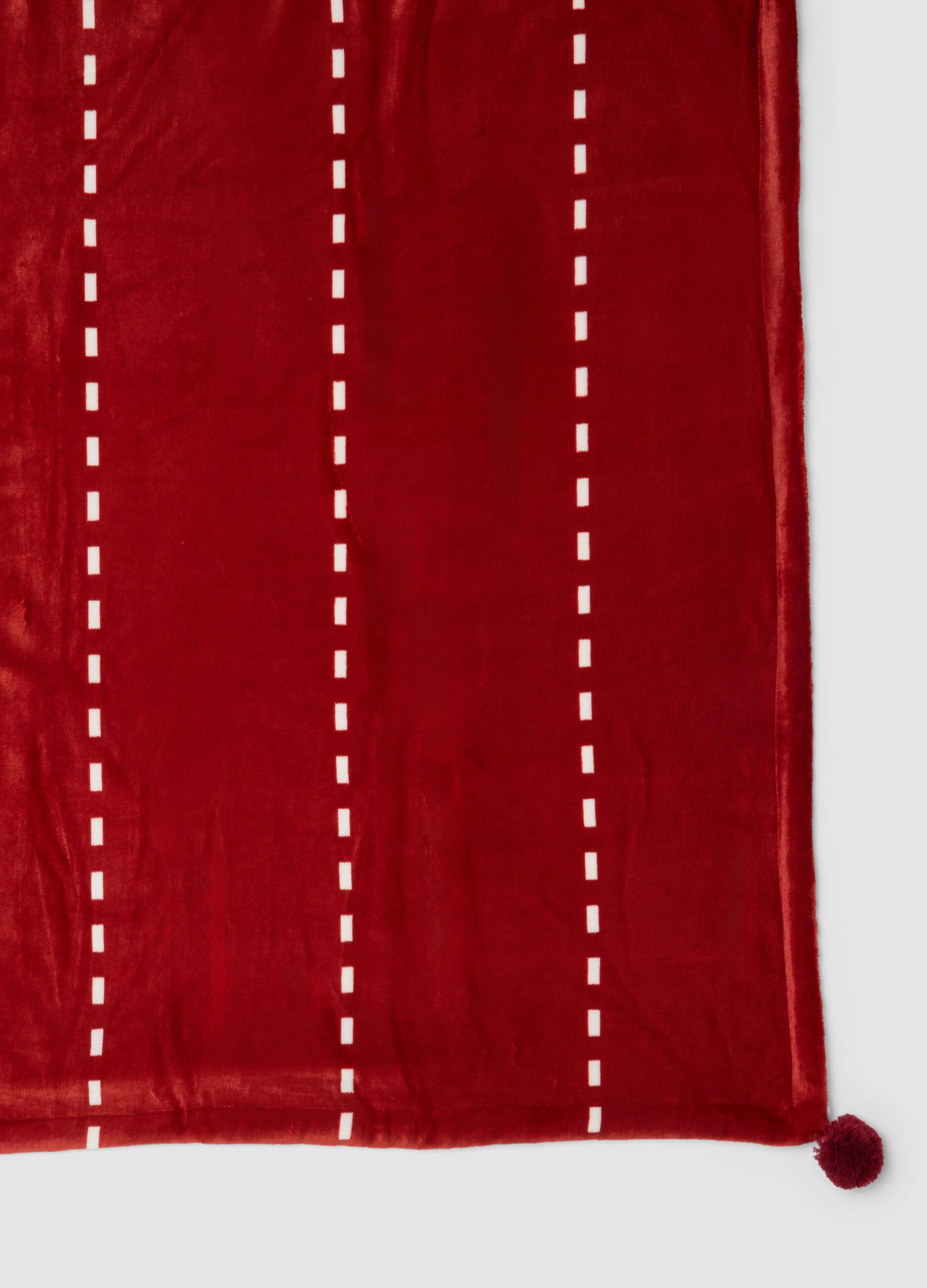Red and white velvety-effect throw with contrasting lining