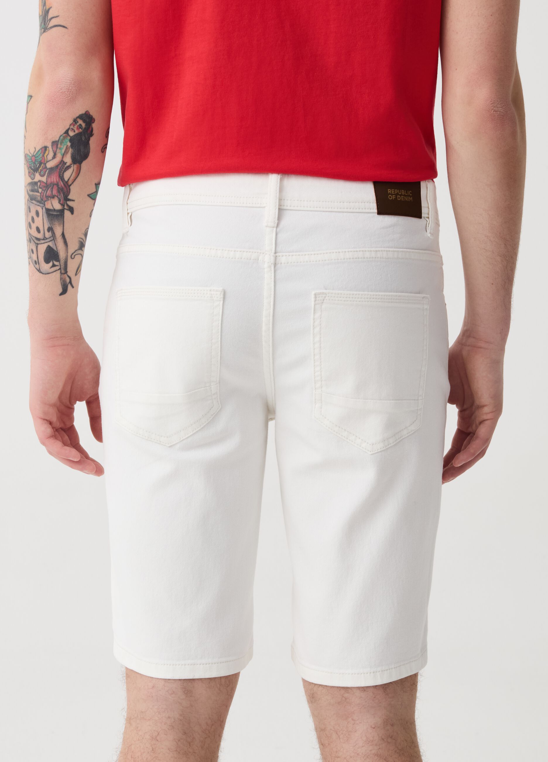 Slim-fit Bermuda shorts in solid colour denim