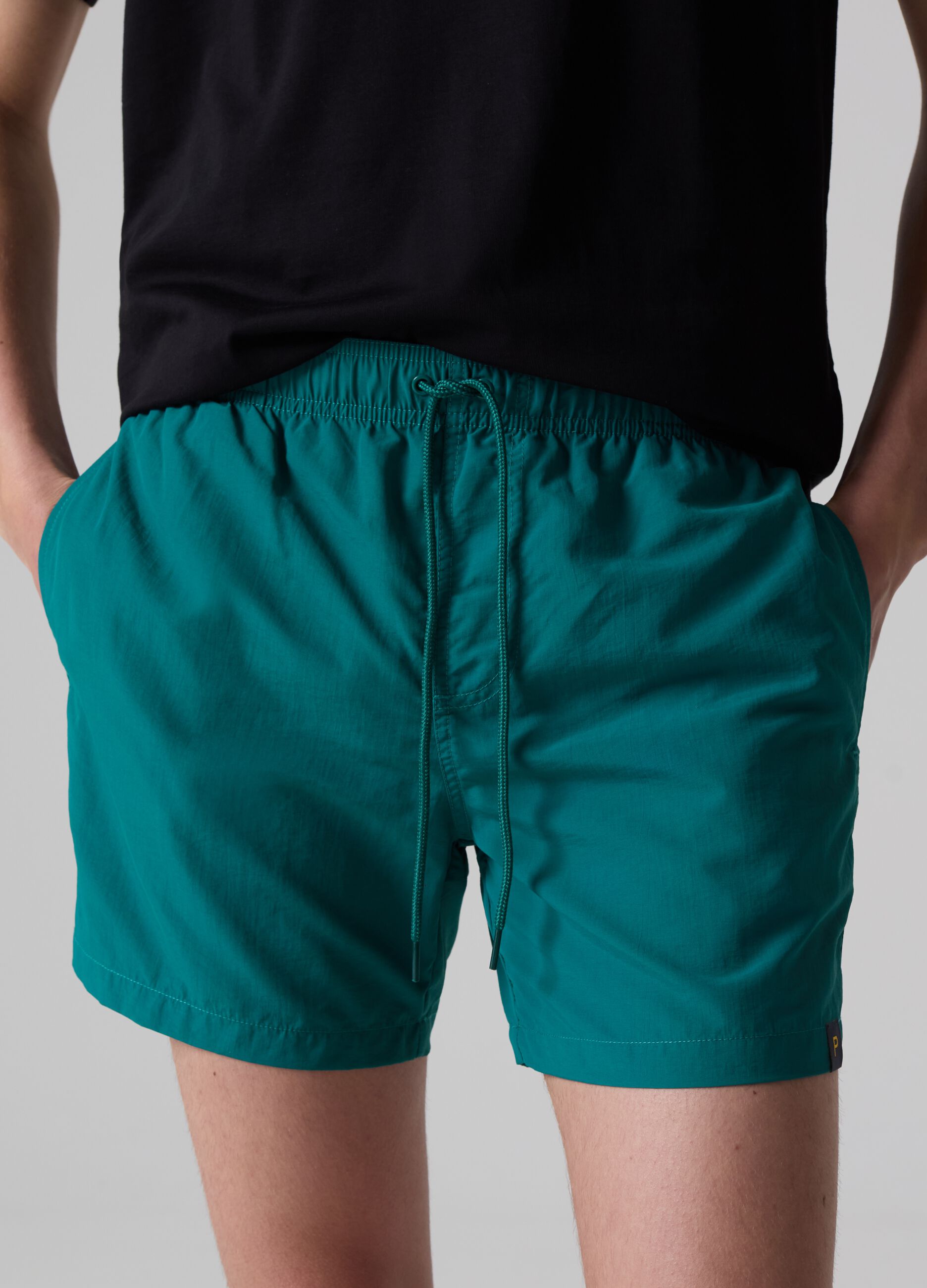 Bermuda swim shorts with drawstring