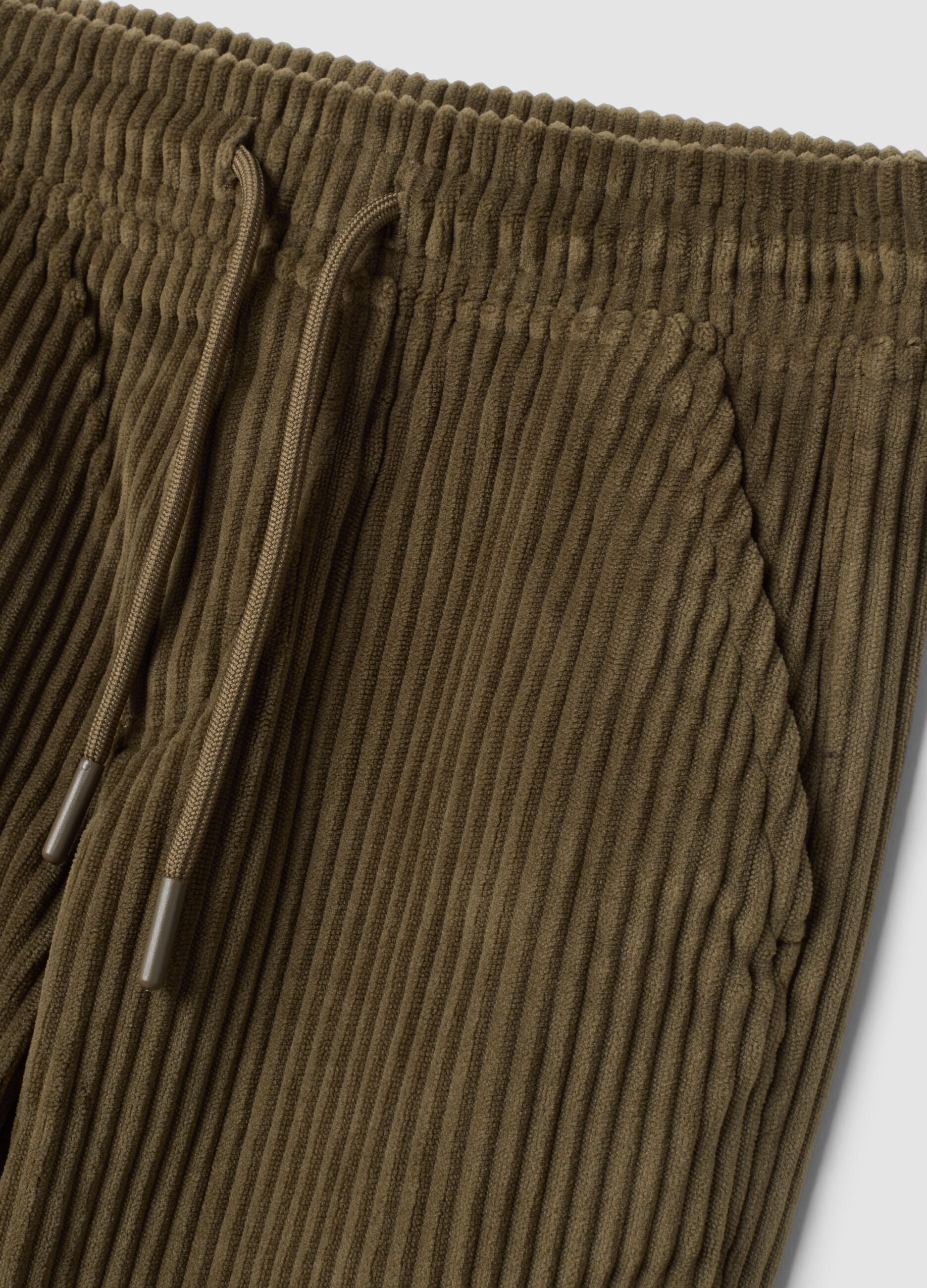 Green ribbed comfort-fit trousers