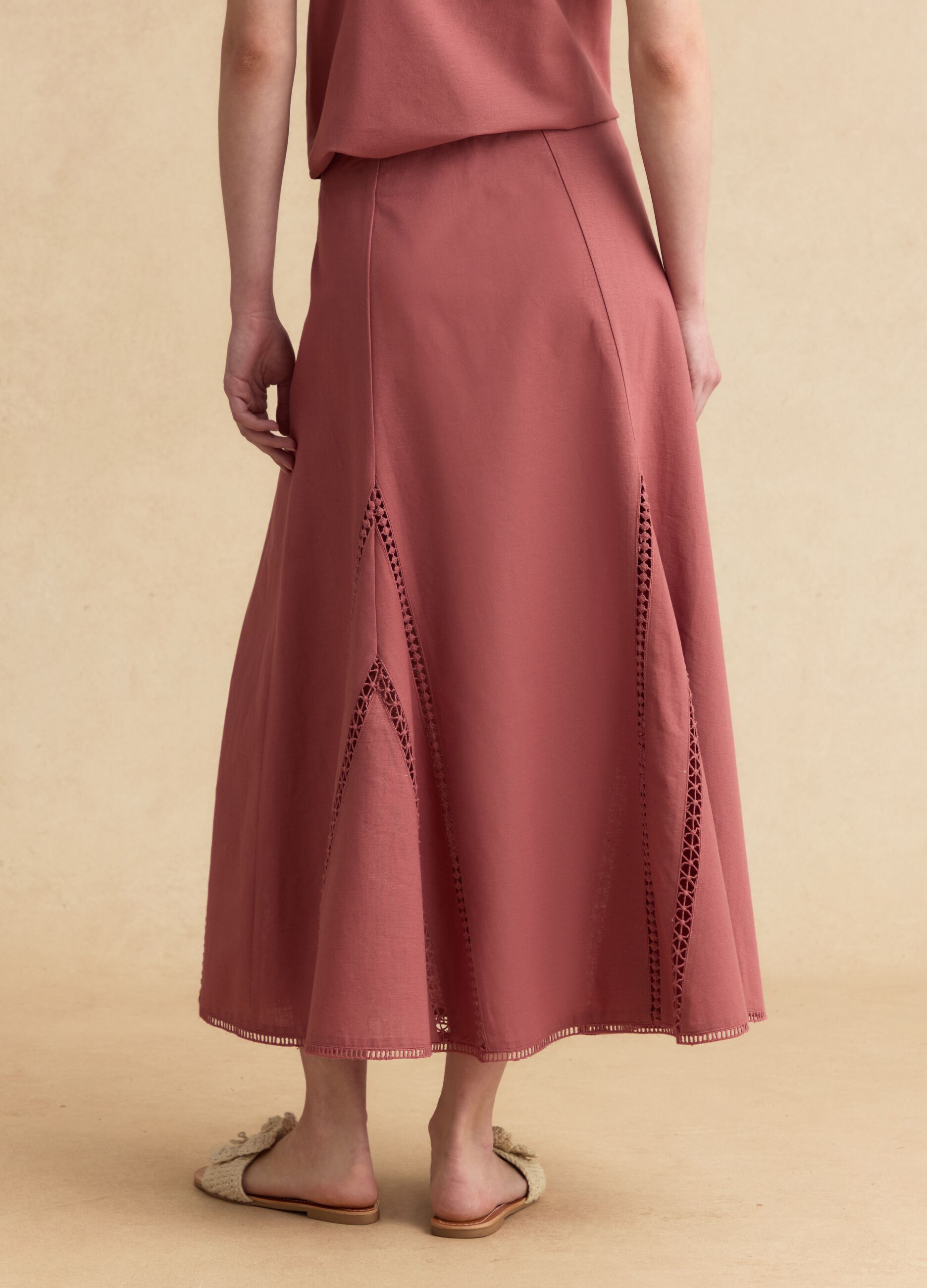 Pink cotton-linen blend skirt with openwork detailing