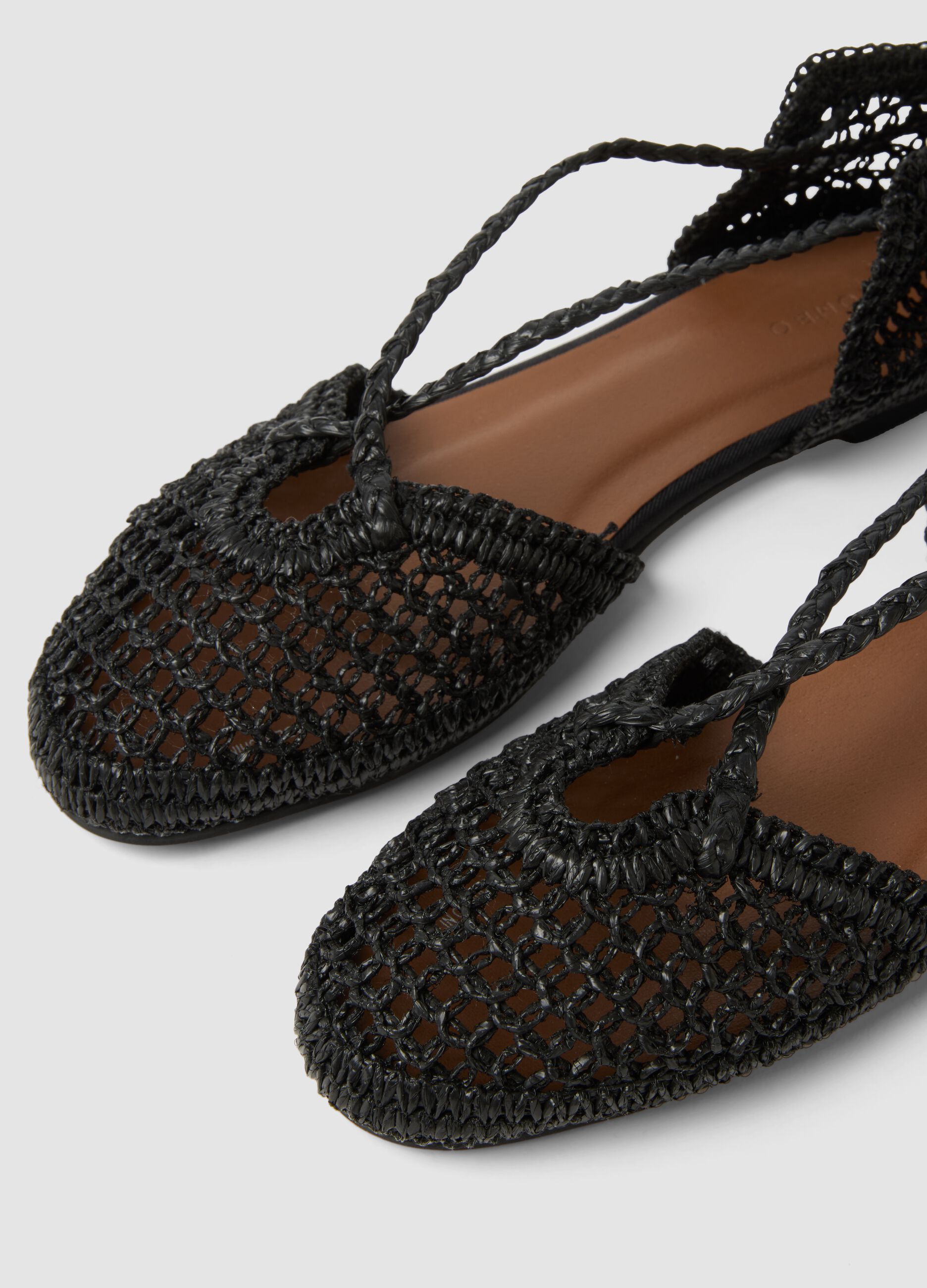 Black woven sandals
