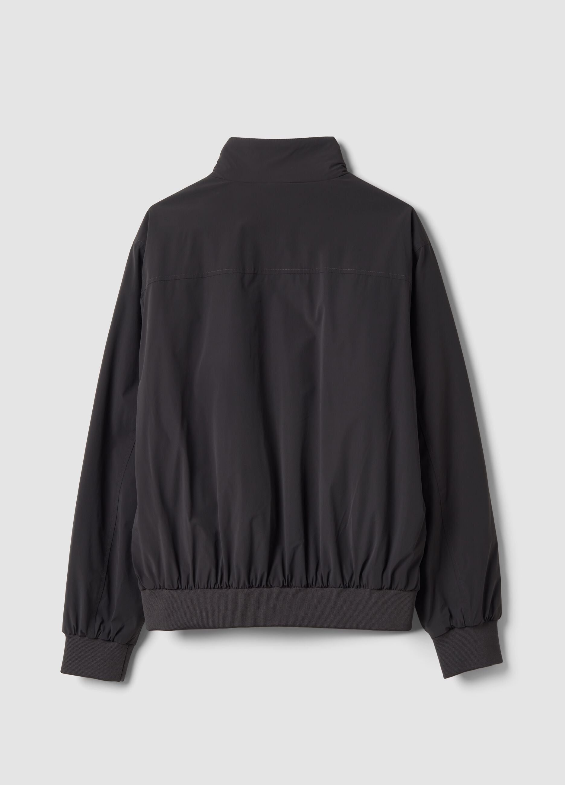 Black stretch-fabric jacket with zip