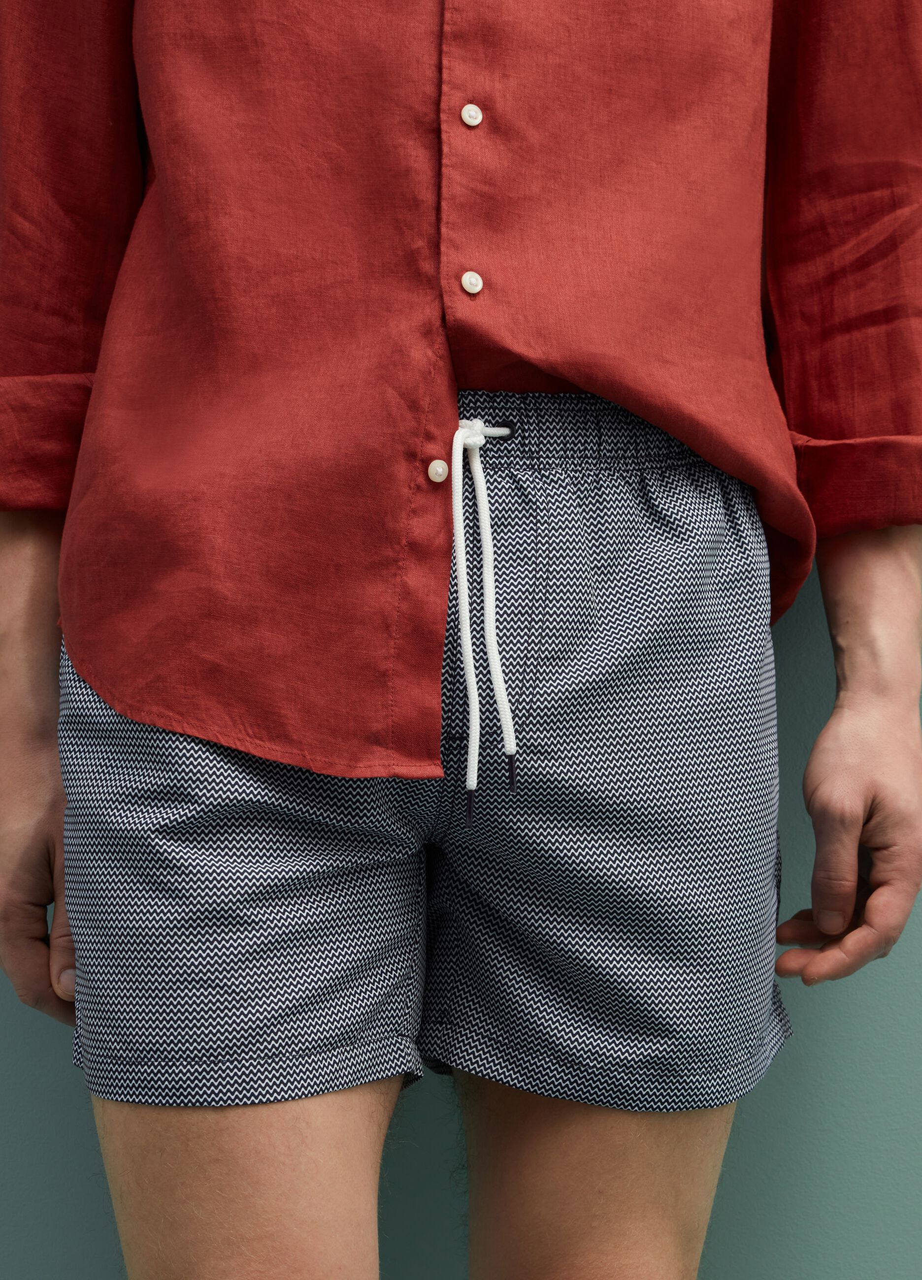 Swimming trunks with waves pattern